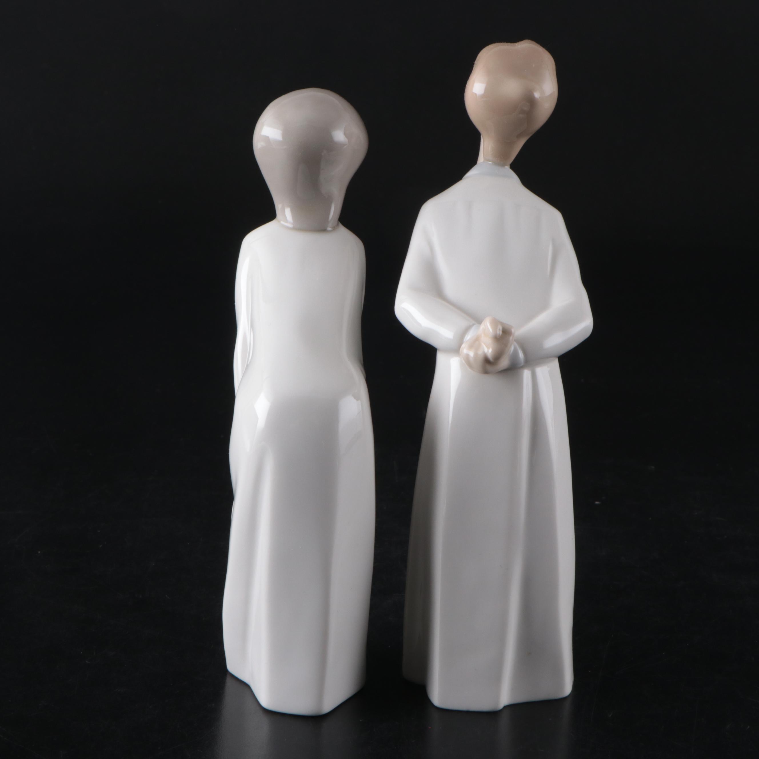 Lladró Kissing Girl and Boy Porcelain Figurines, Designed by Fulgencio Garcia