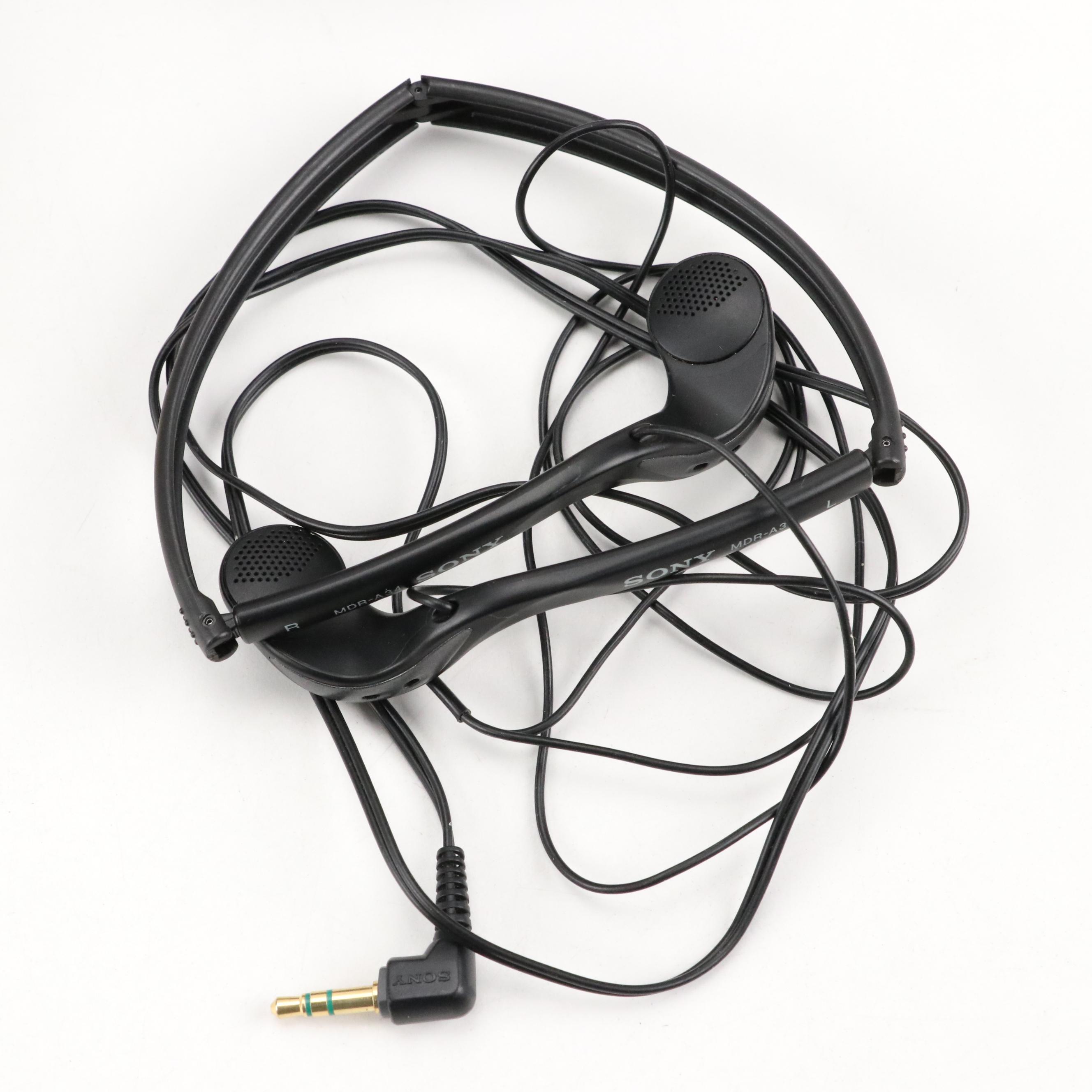 Sony FM/AM Sports Walkman with CD Player, Headphones and Mio Pup Toy