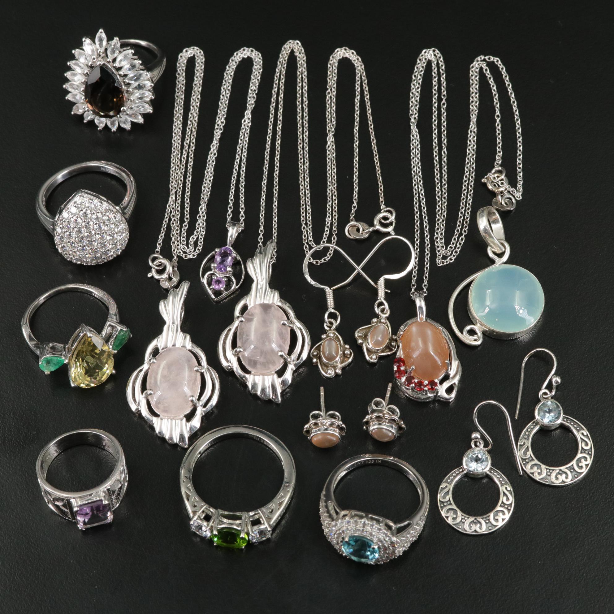 Group of 14 Assorted Sterling Silver Rings, Necklaces, Earrings, and Pendants