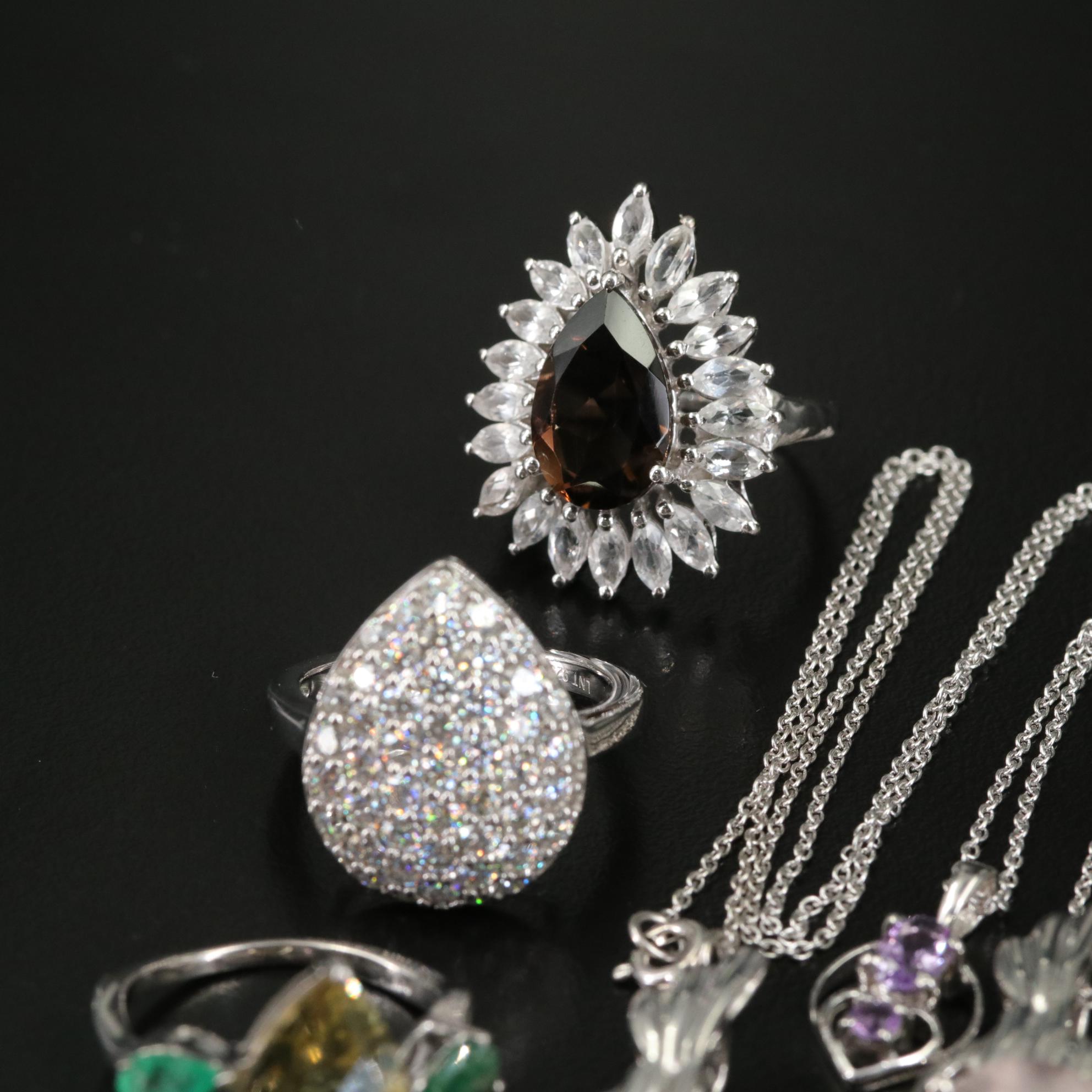 Group of 14 Assorted Sterling Silver Rings, Necklaces, Earrings, and Pendants