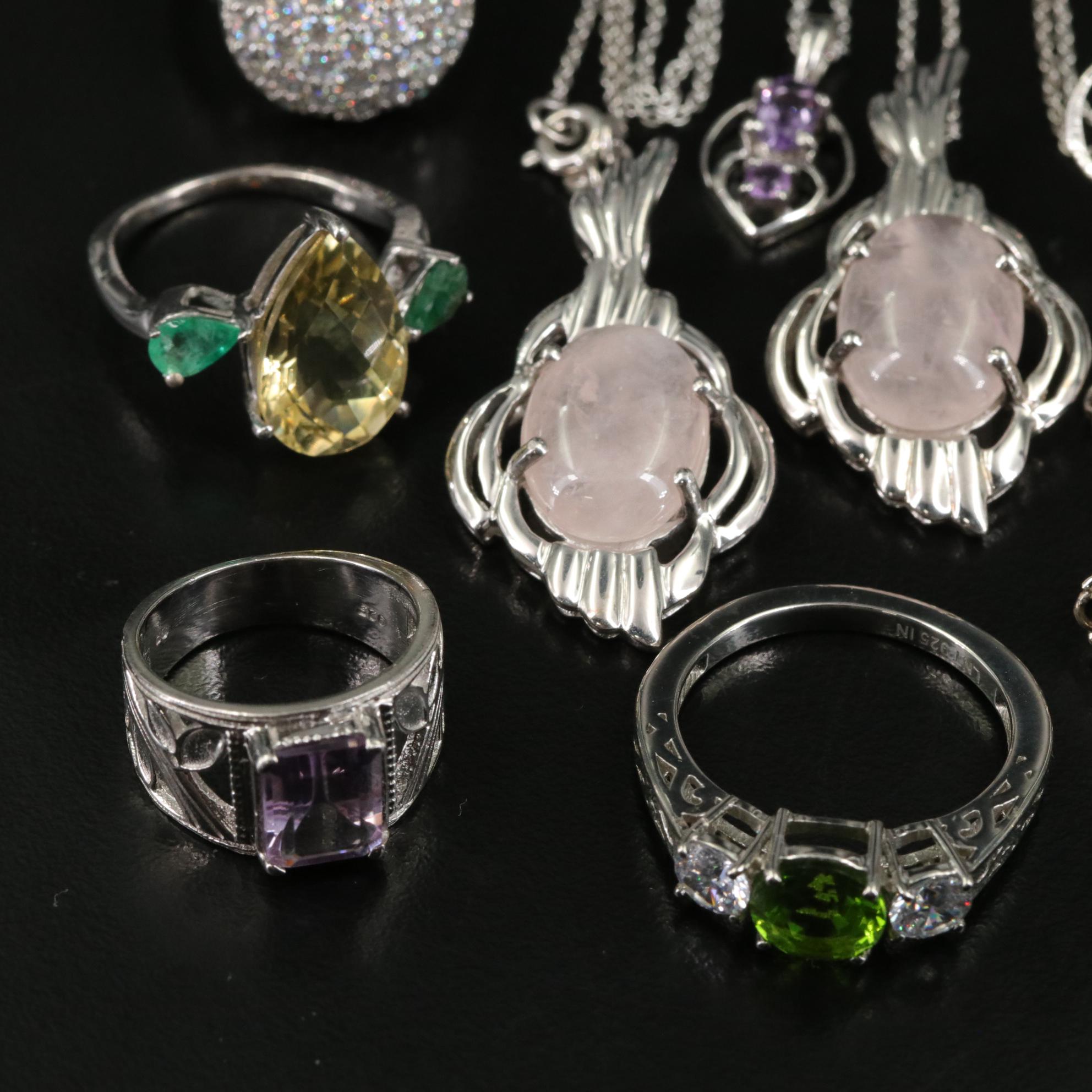 Group of 14 Assorted Sterling Silver Rings, Necklaces, Earrings, and Pendants