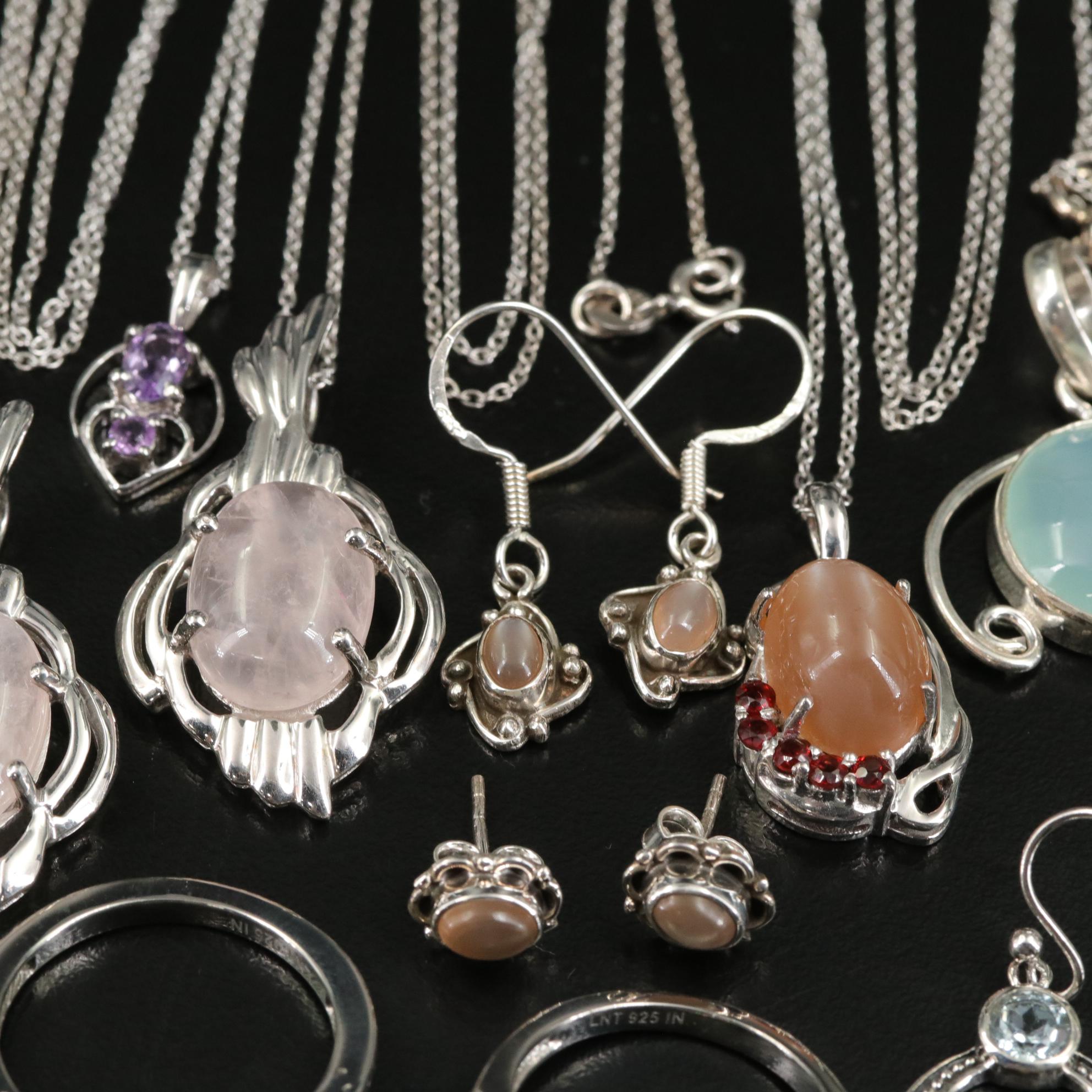 Group of 14 Assorted Sterling Silver Rings, Necklaces, Earrings, and Pendants