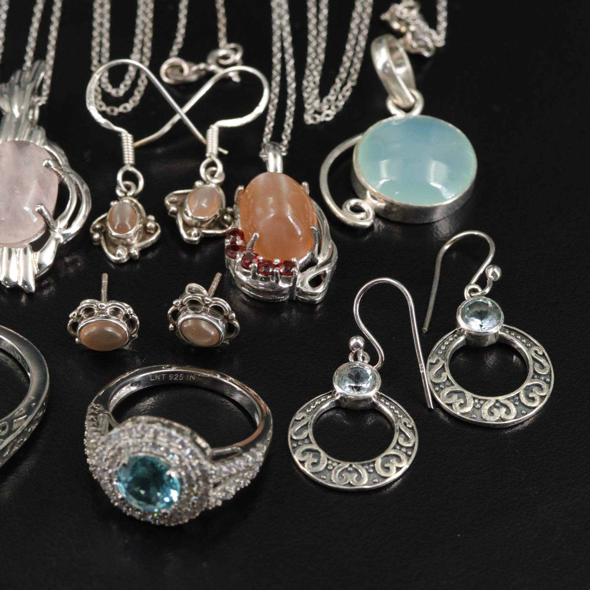 Group of 14 Assorted Sterling Silver Rings, Necklaces, Earrings, and Pendants