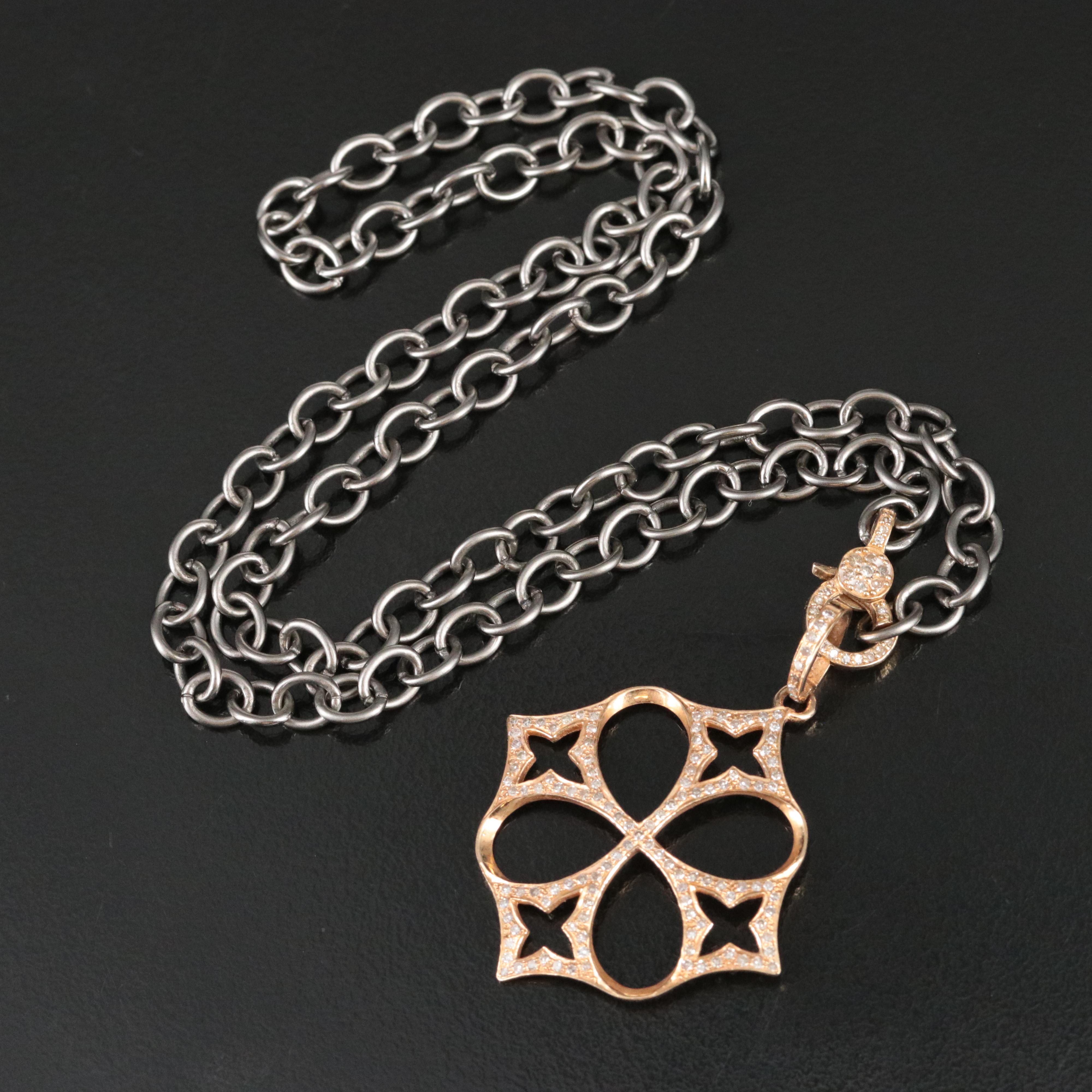 14K Diamond Pendant and Clasp on Sterling Chain