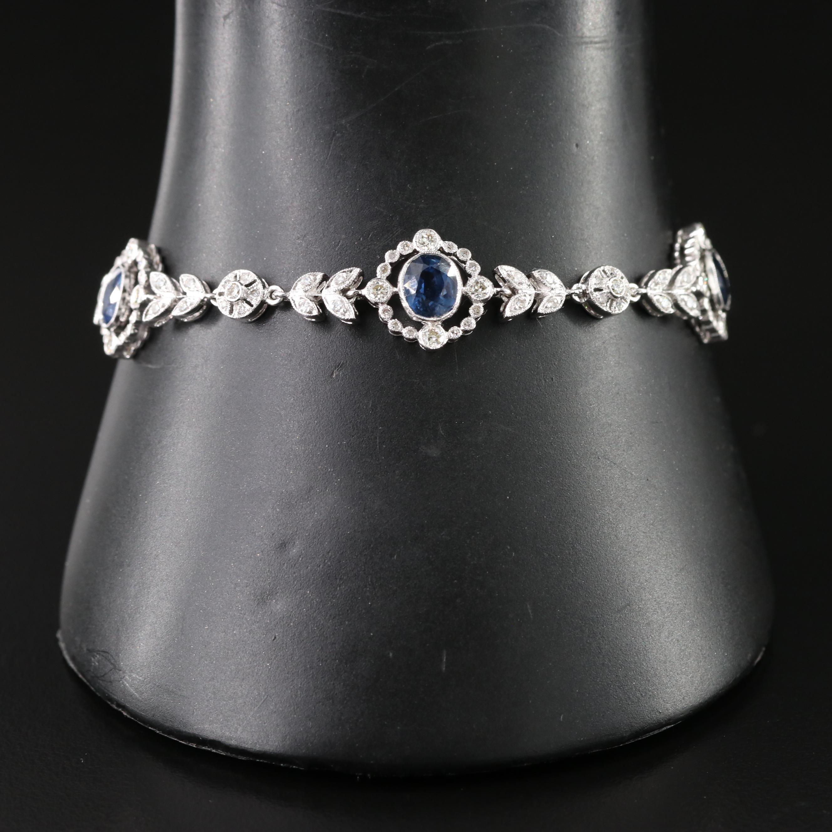 18K 3.00 CTW Sapphire and 1.52 CTW Diamond Laurel Station Bracelet