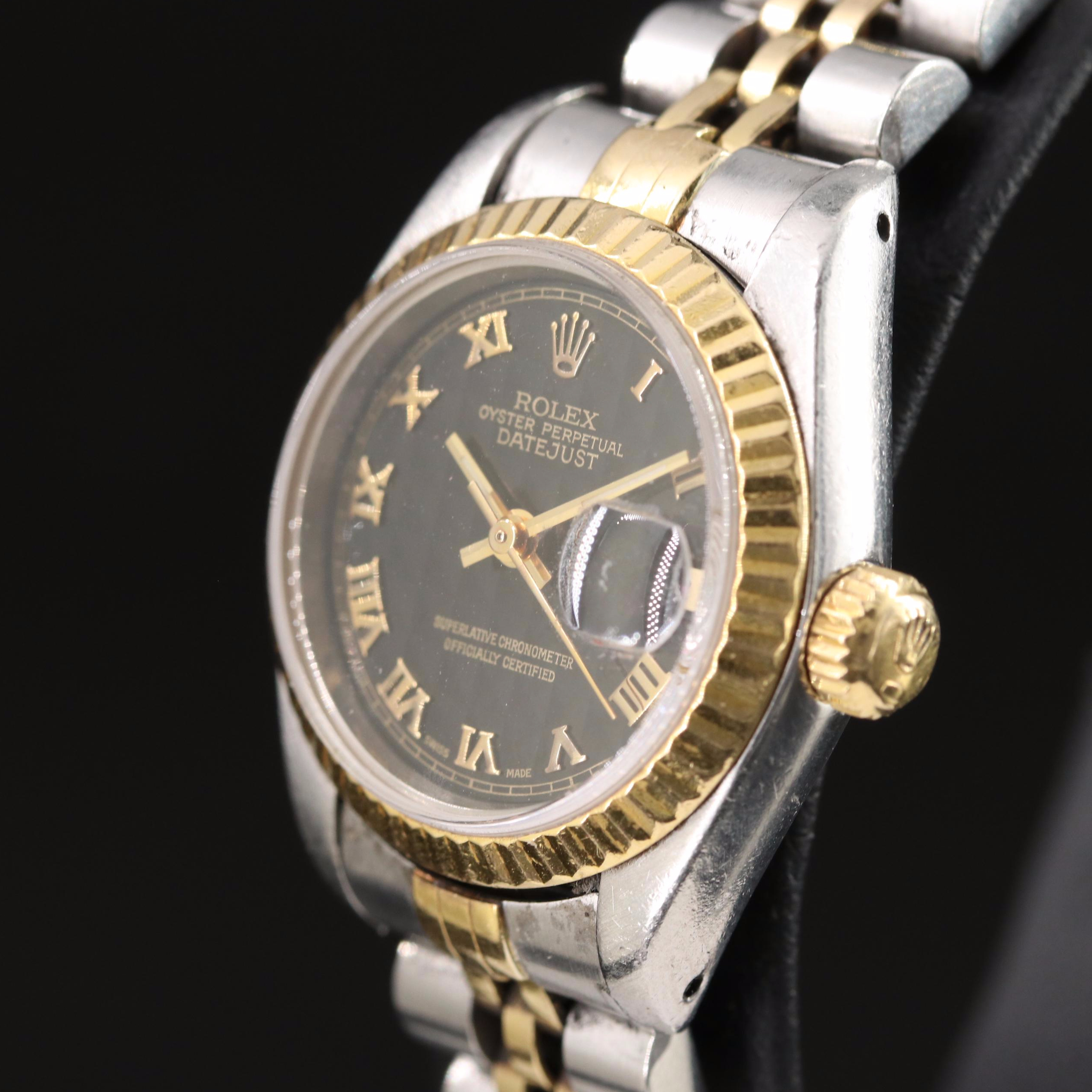 1991 18K Gold and Steelinox Rolex Black Pyramid Roman Dial Datejust Watch