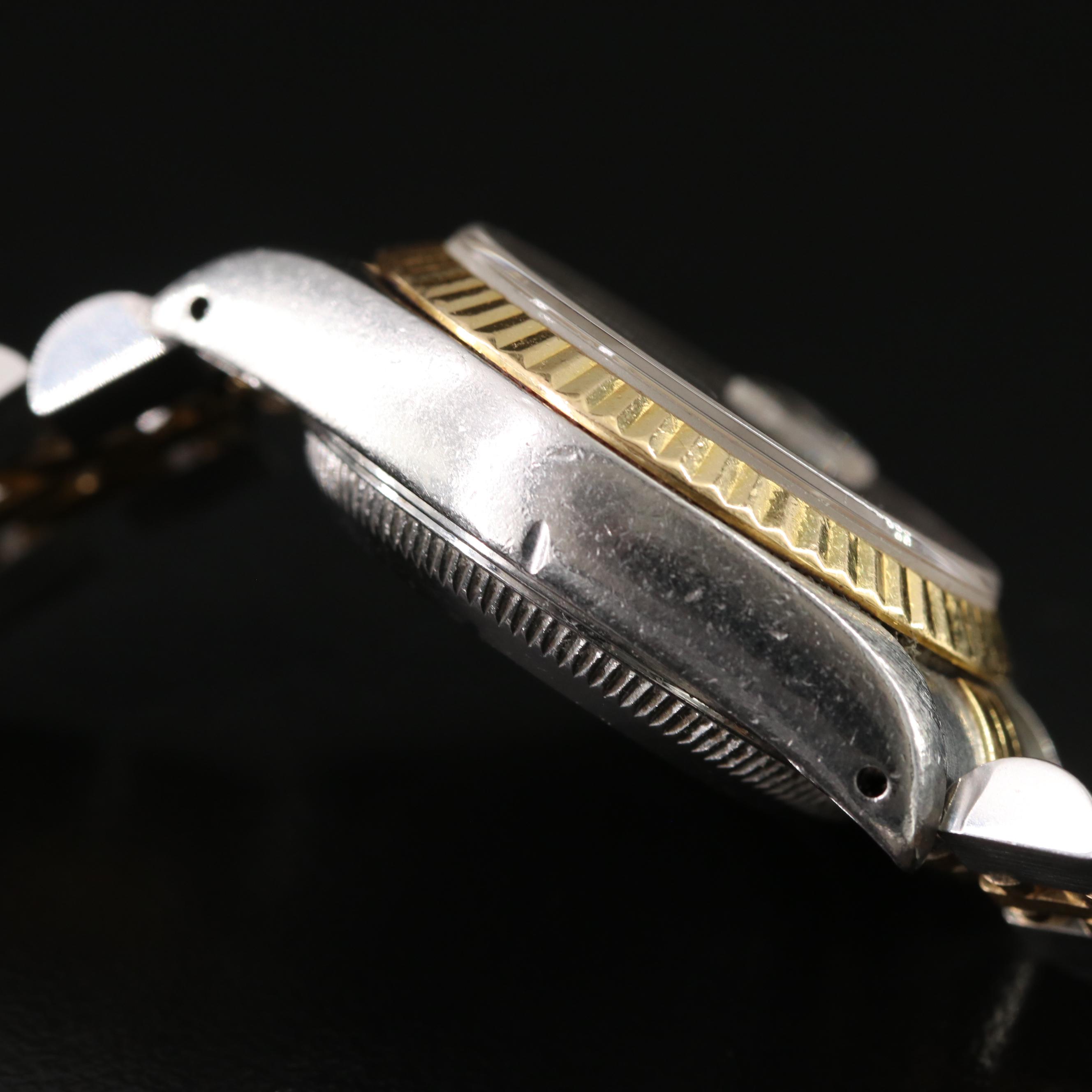 1991 18K Gold and Steelinox Rolex Black Pyramid Roman Dial Datejust Watch