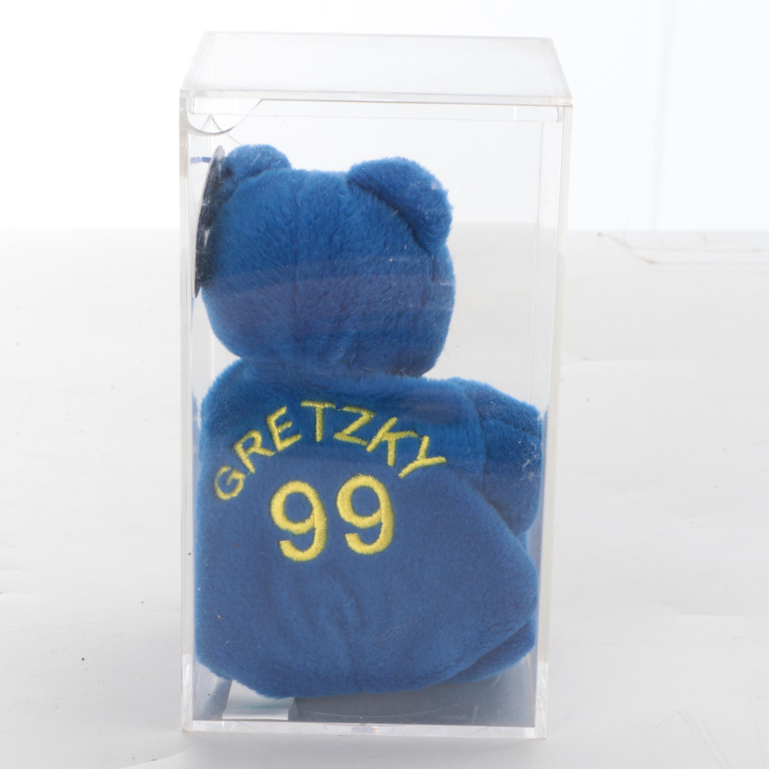 Cincinnati Cyclones and Mighty Ducks Hockey Sticks and Puck with Gretzky Bear