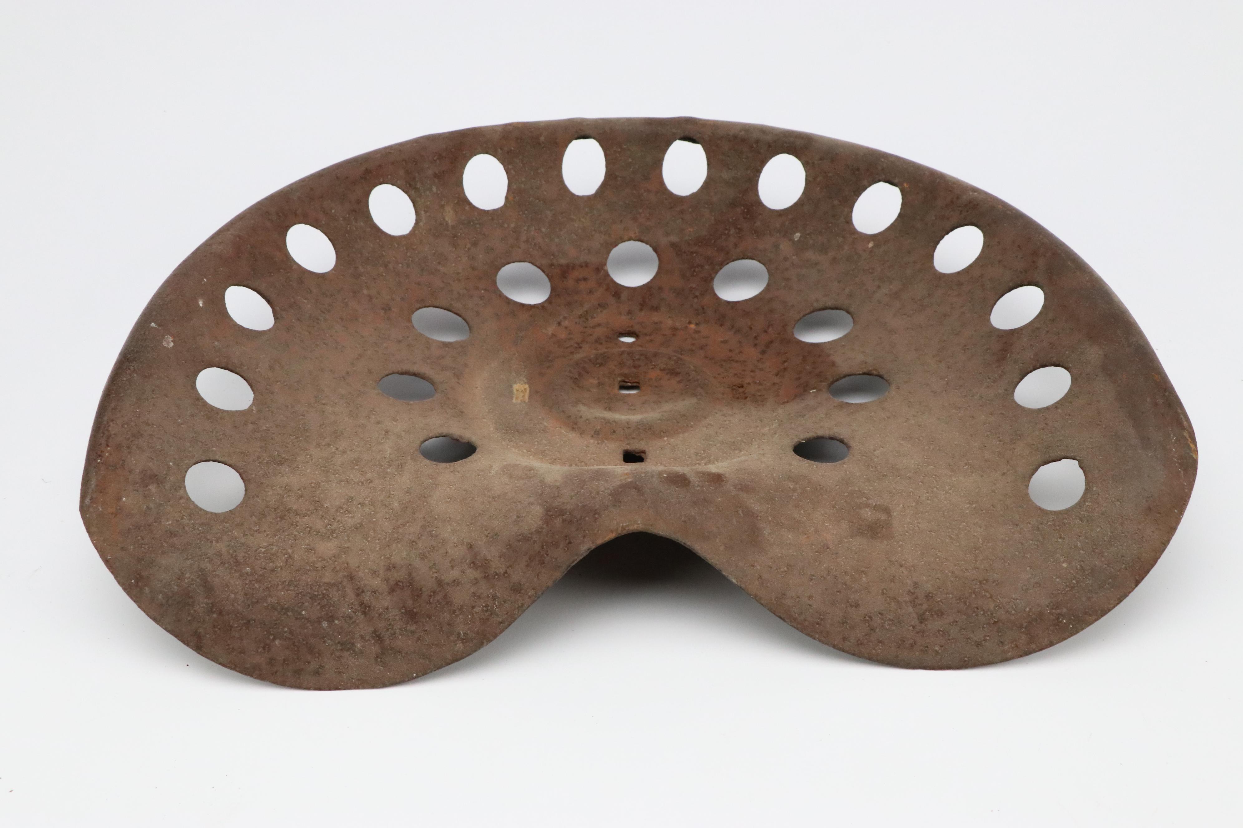 Buckeye and Other Cast Iron Tractor Seats, Early to Mid-20th Century