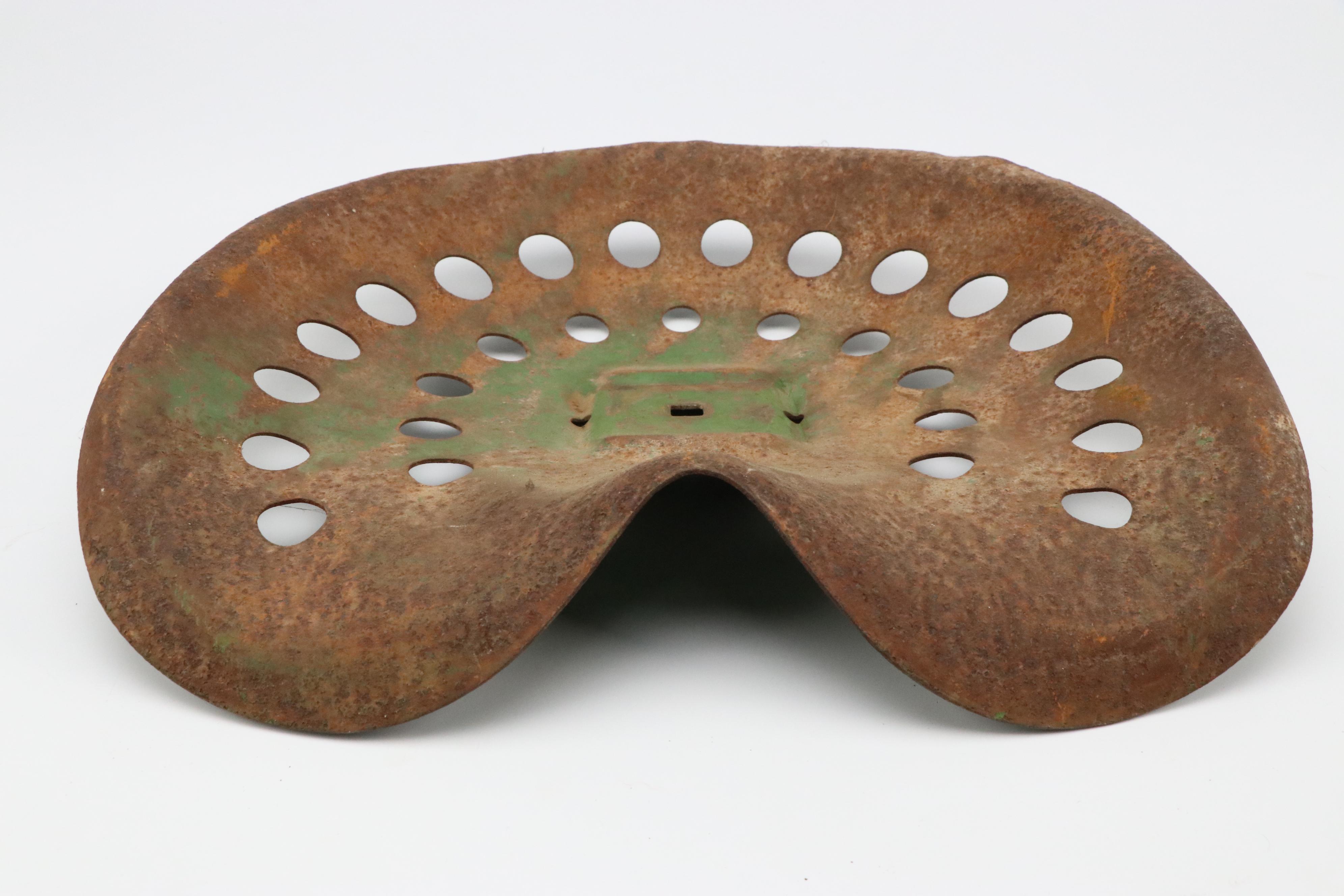 Buckeye and Other Cast Iron Tractor Seats, Early to Mid-20th Century