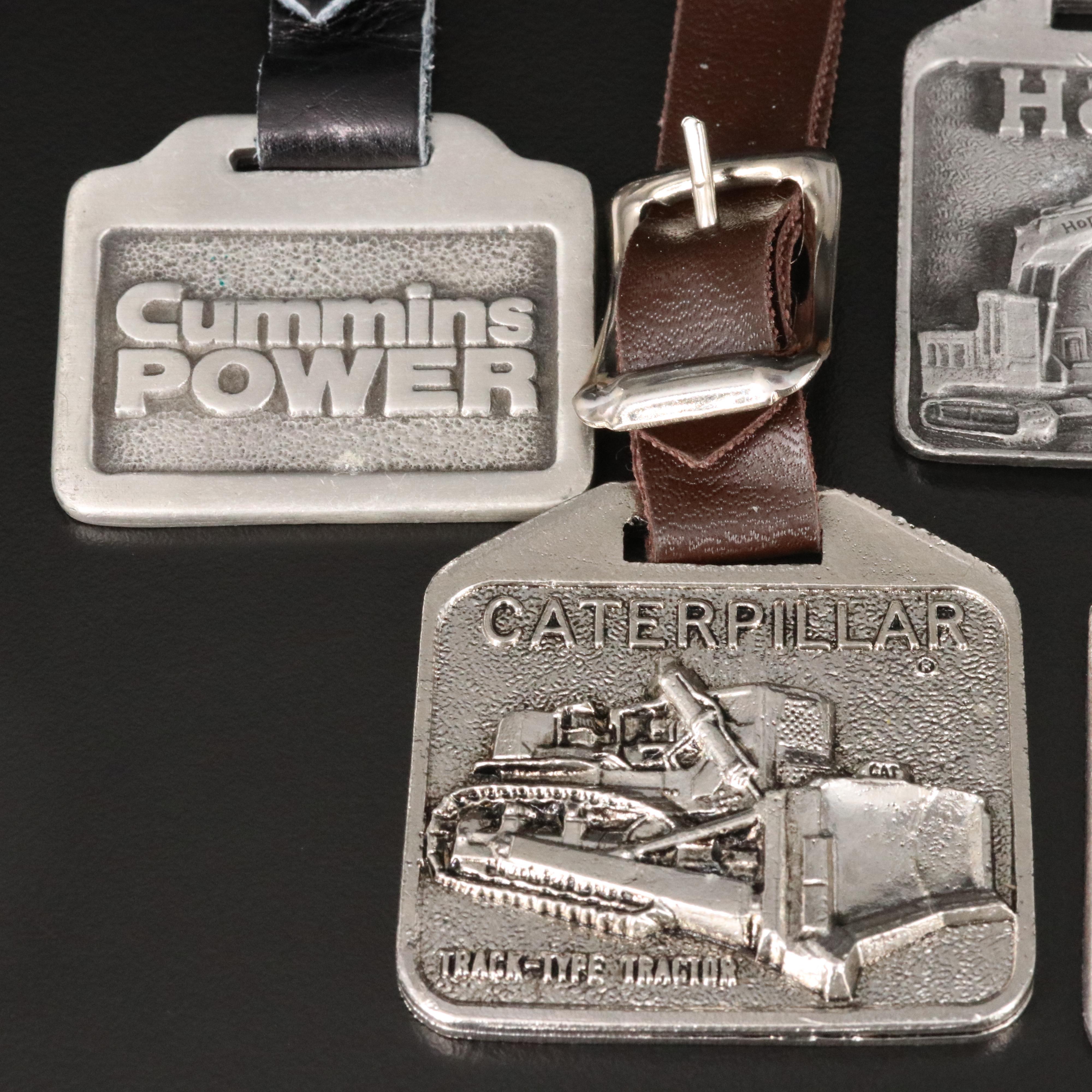 Construction Key Fobs Including Enamel