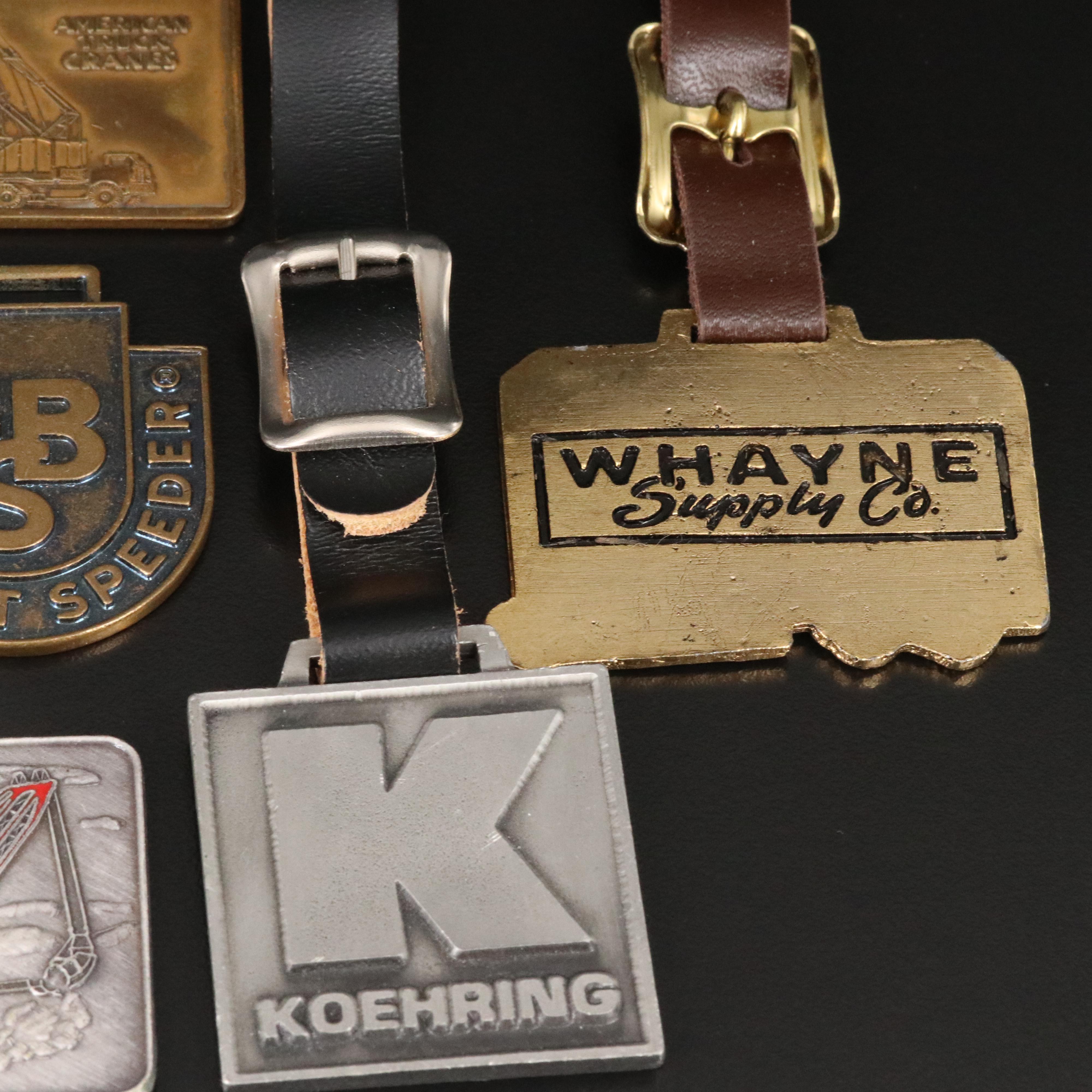 Construction Key Fobs Including Enamel