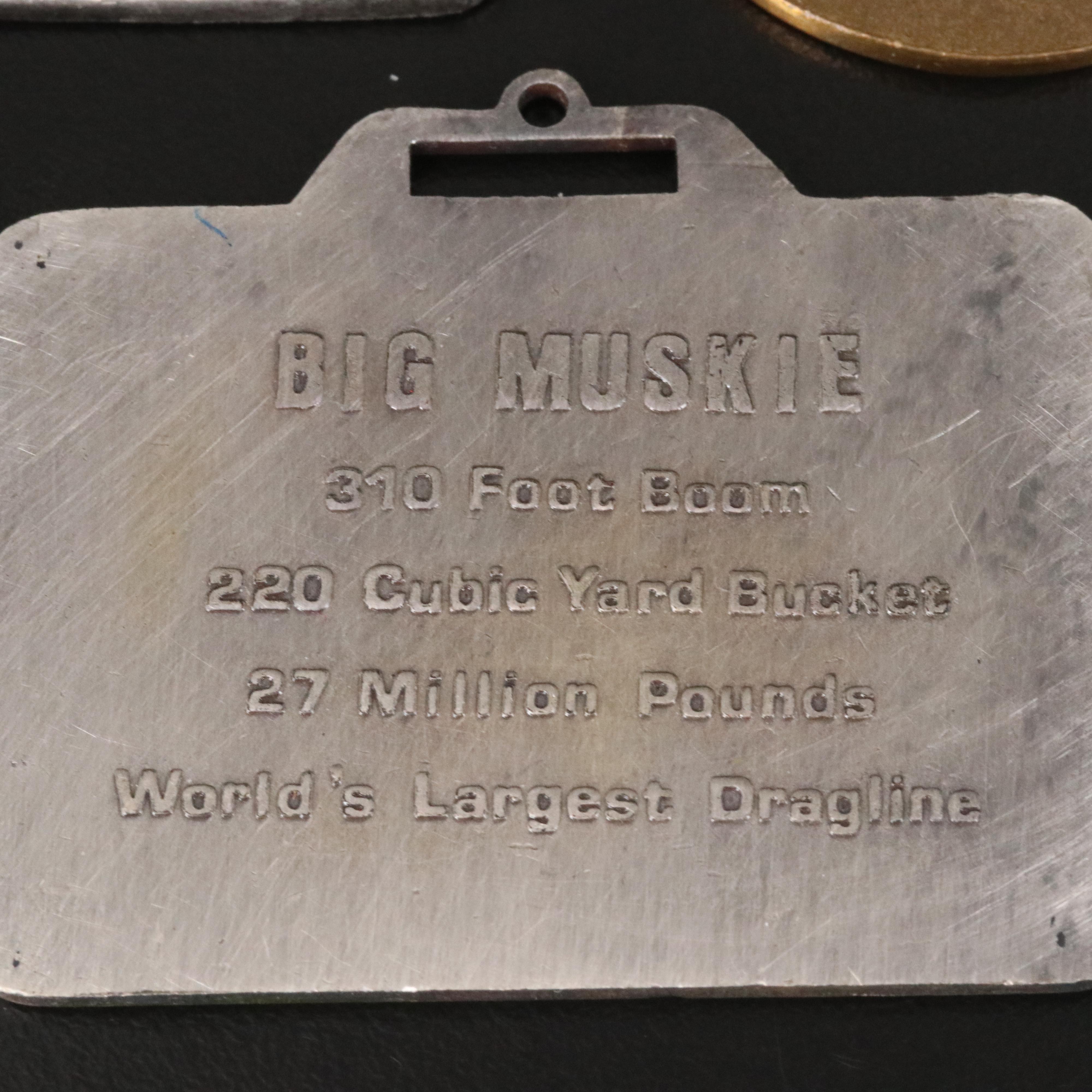 Construction Key Fobs Including Enamel