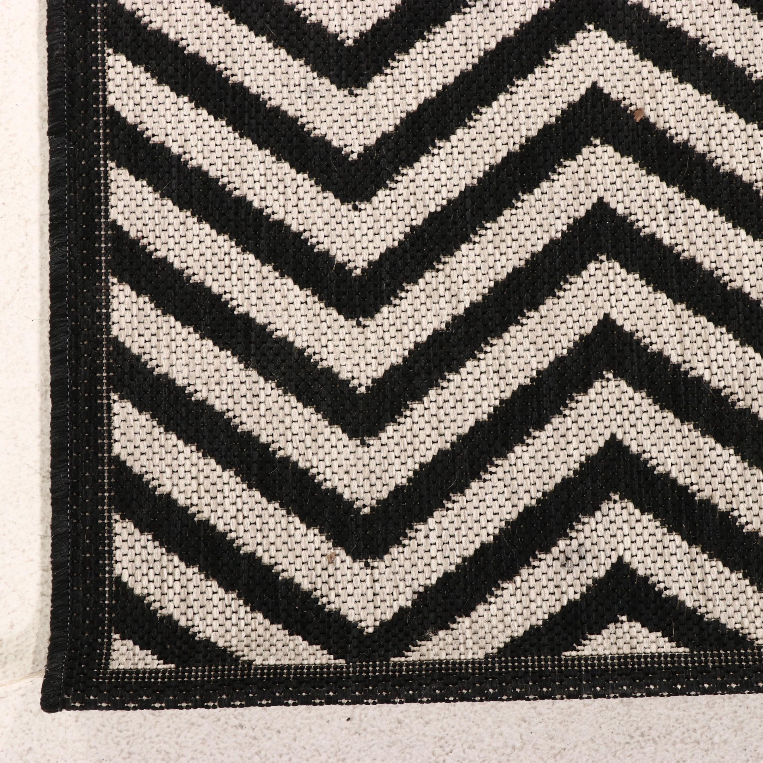 Three Machine Made Chevron Patterned Area Rugs