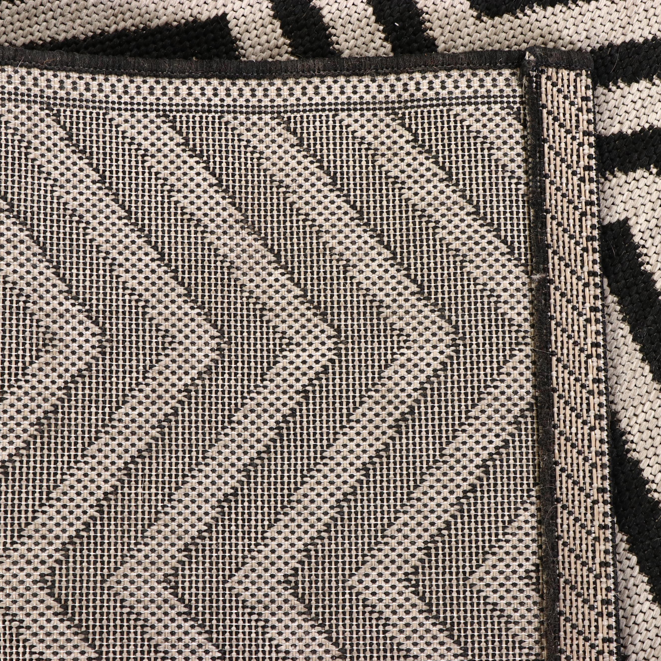 Three Machine Made Chevron Patterned Area Rugs