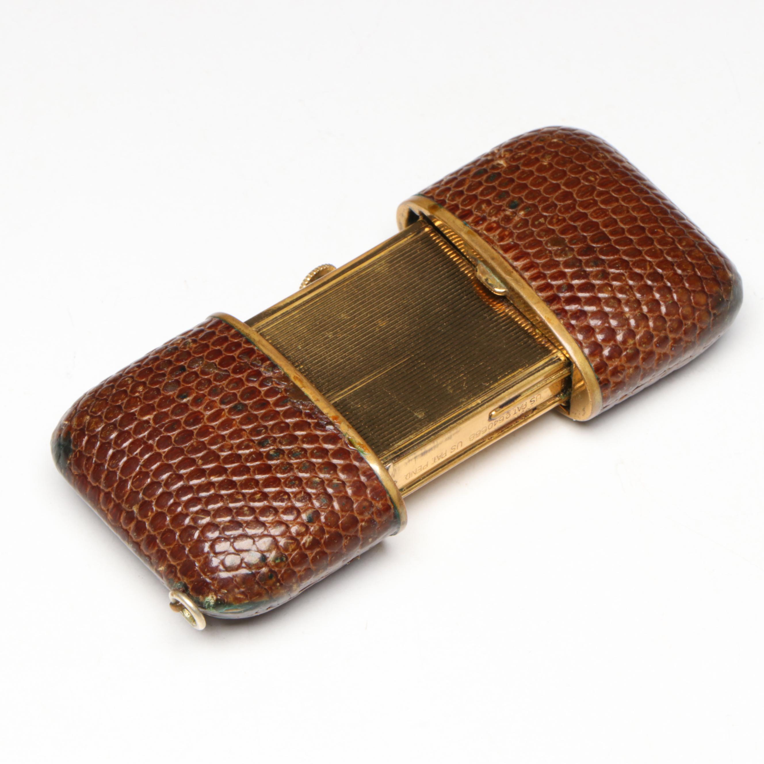 German Laco 17 Jewel Travel Clock with Sliding Lizard Skin Case, circa 1953