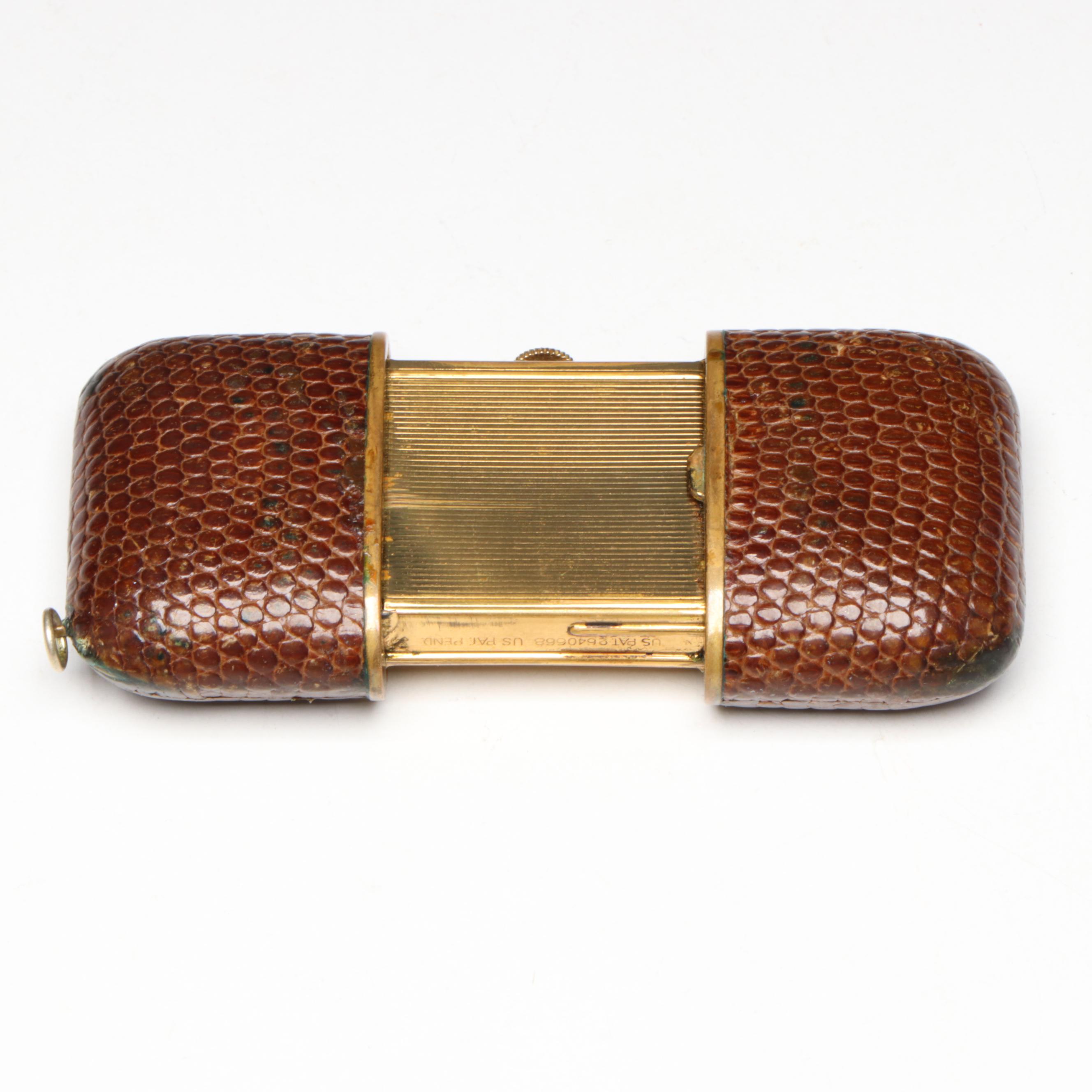 German Laco 17 Jewel Travel Clock with Sliding Lizard Skin Case, circa 1953