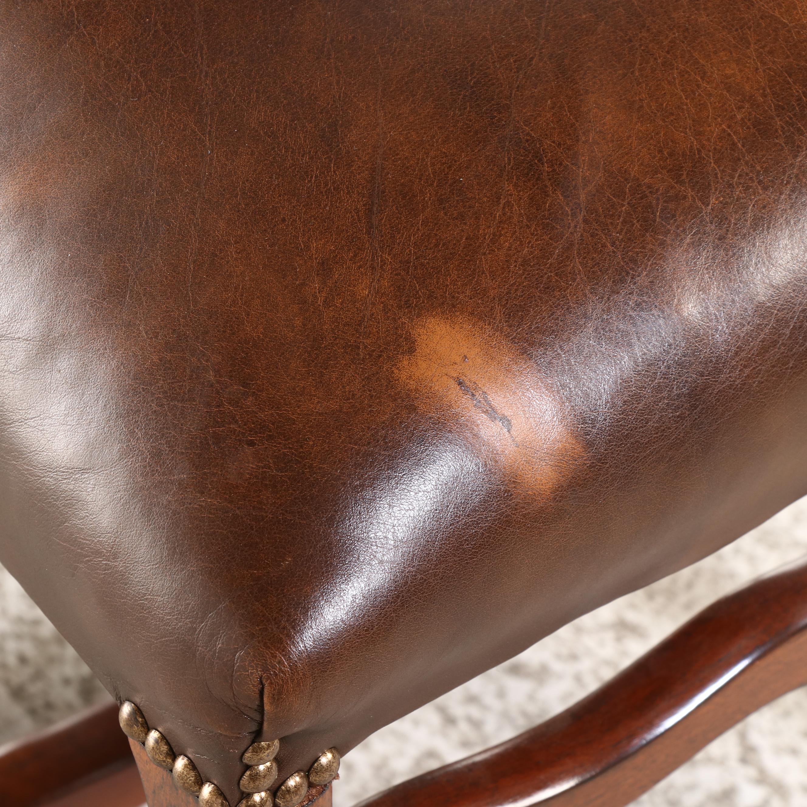 Spanish Baroque Style Walnut Pedestal Table and Six Leather Upholstered Chairs