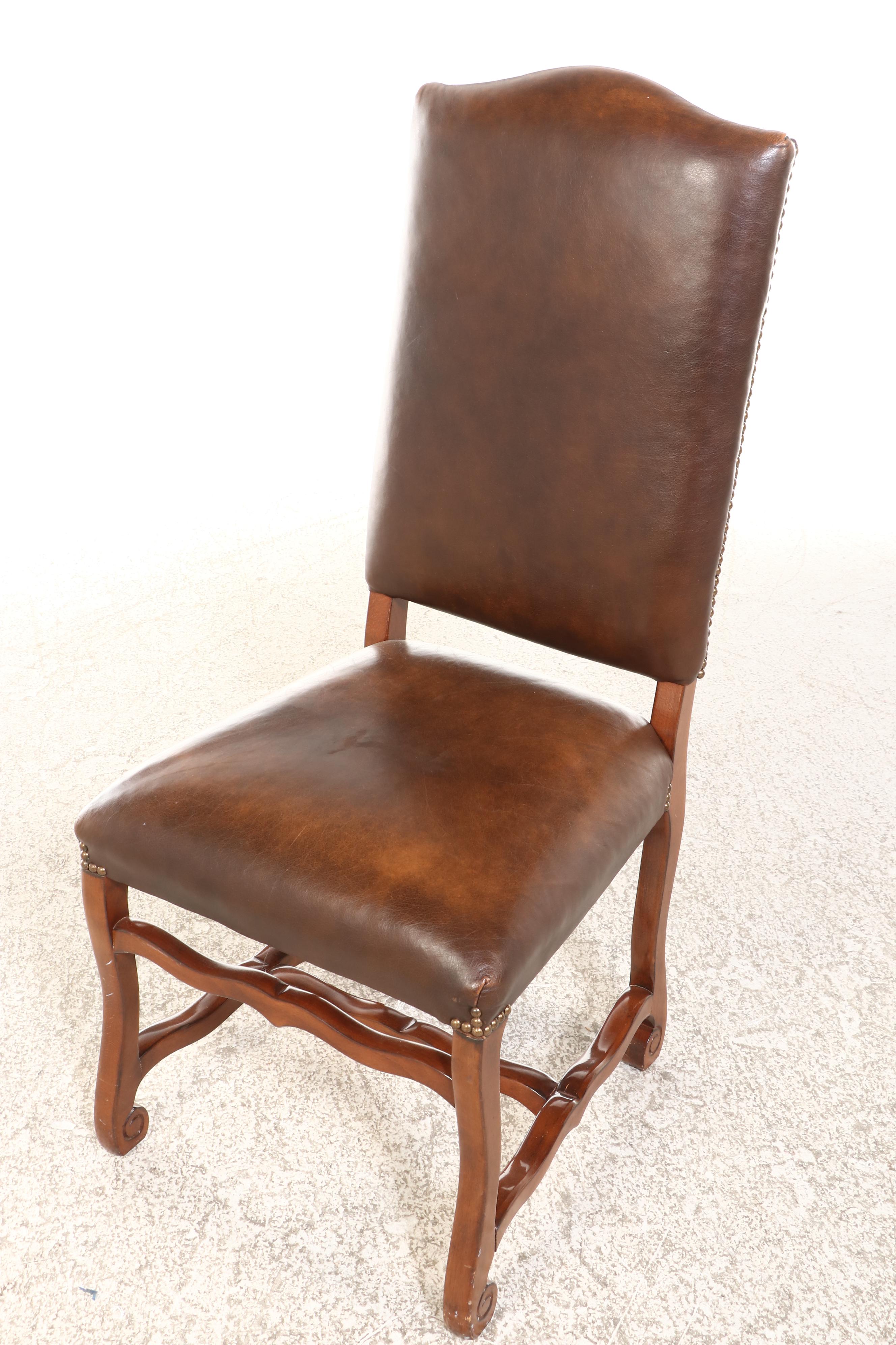 Spanish Baroque Style Walnut Pedestal Table and Six Leather Upholstered Chairs