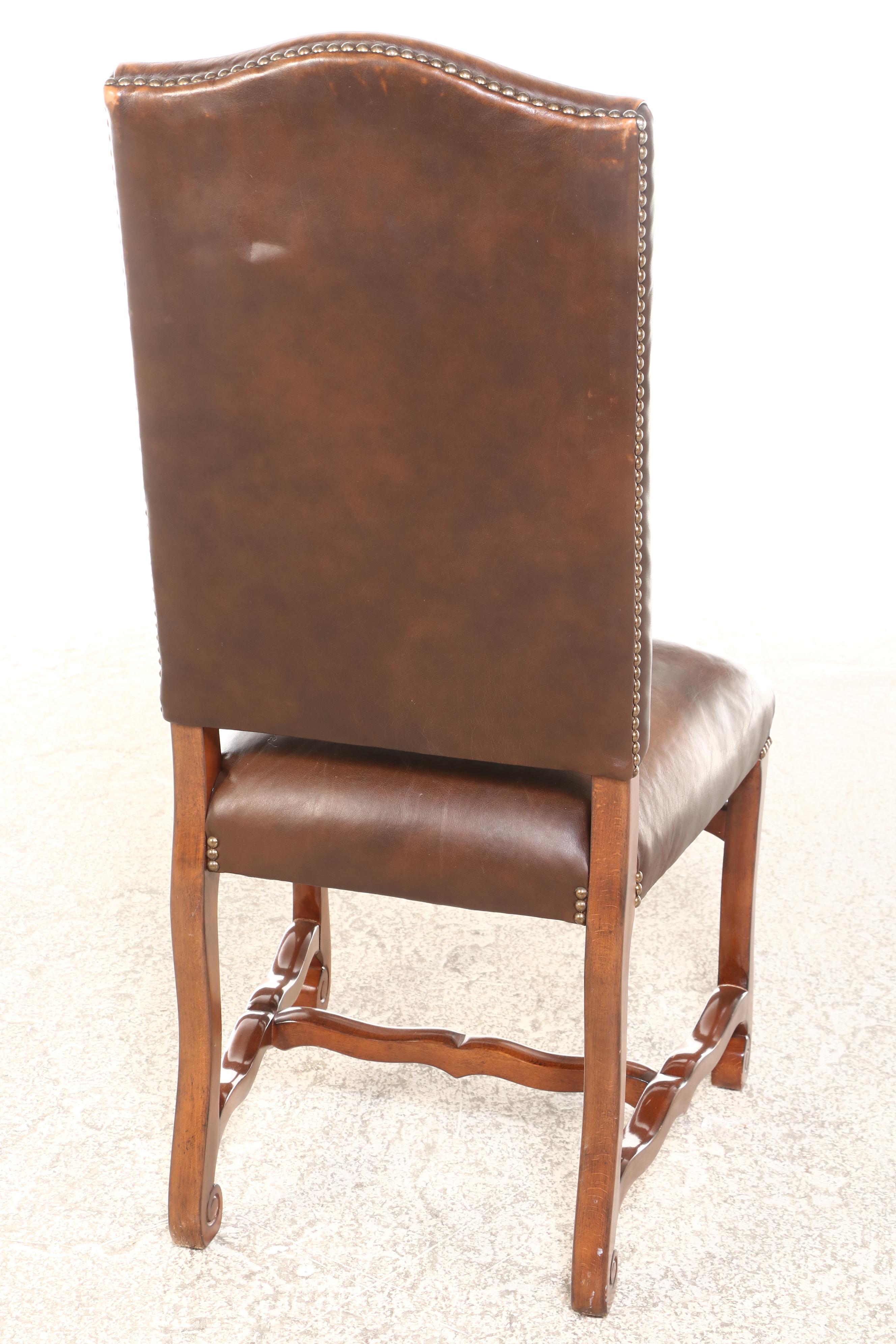 Spanish Baroque Style Walnut Pedestal Table and Six Leather Upholstered Chairs