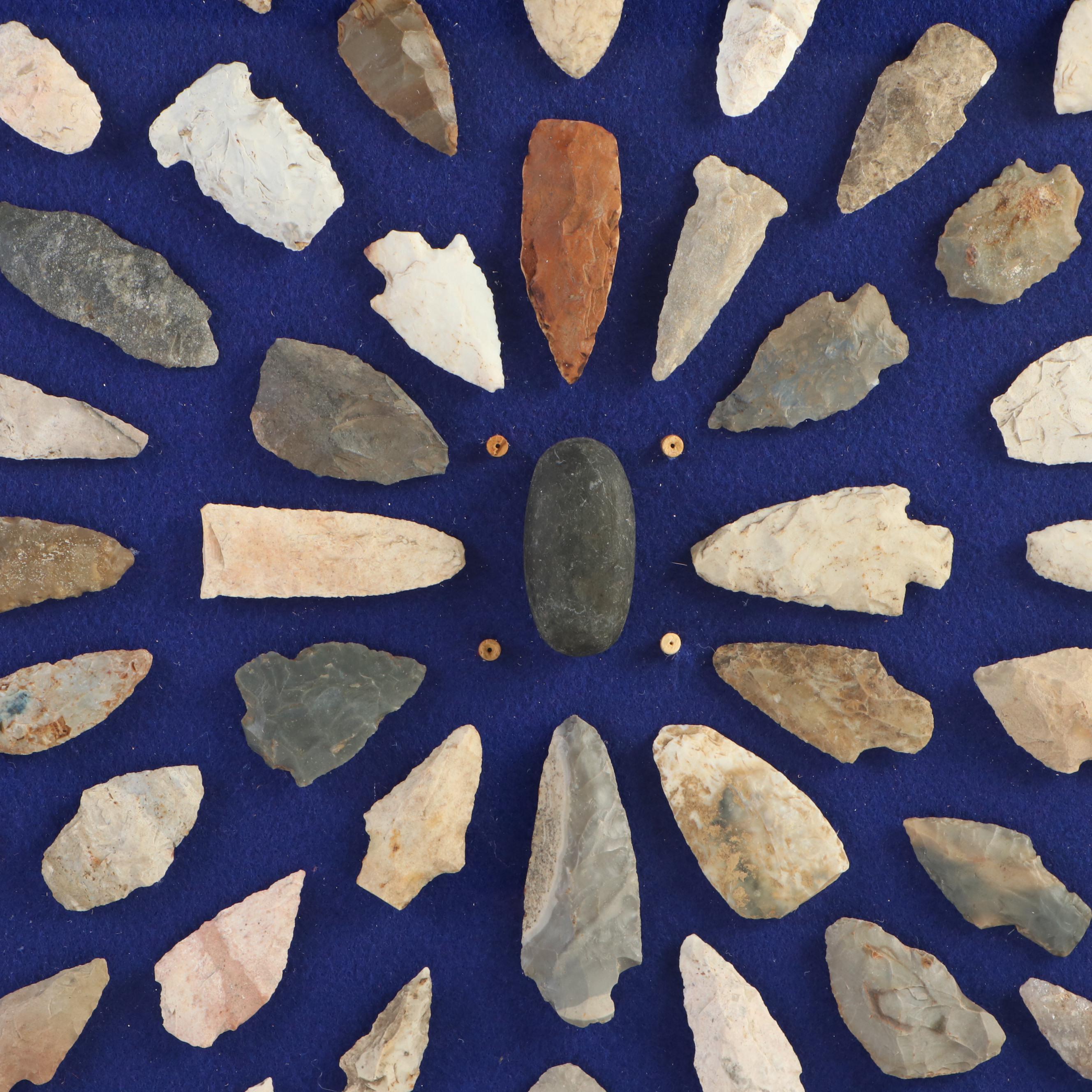 Knapped Stone Projectile Points, Beads, and Knapping Stone in Display Case