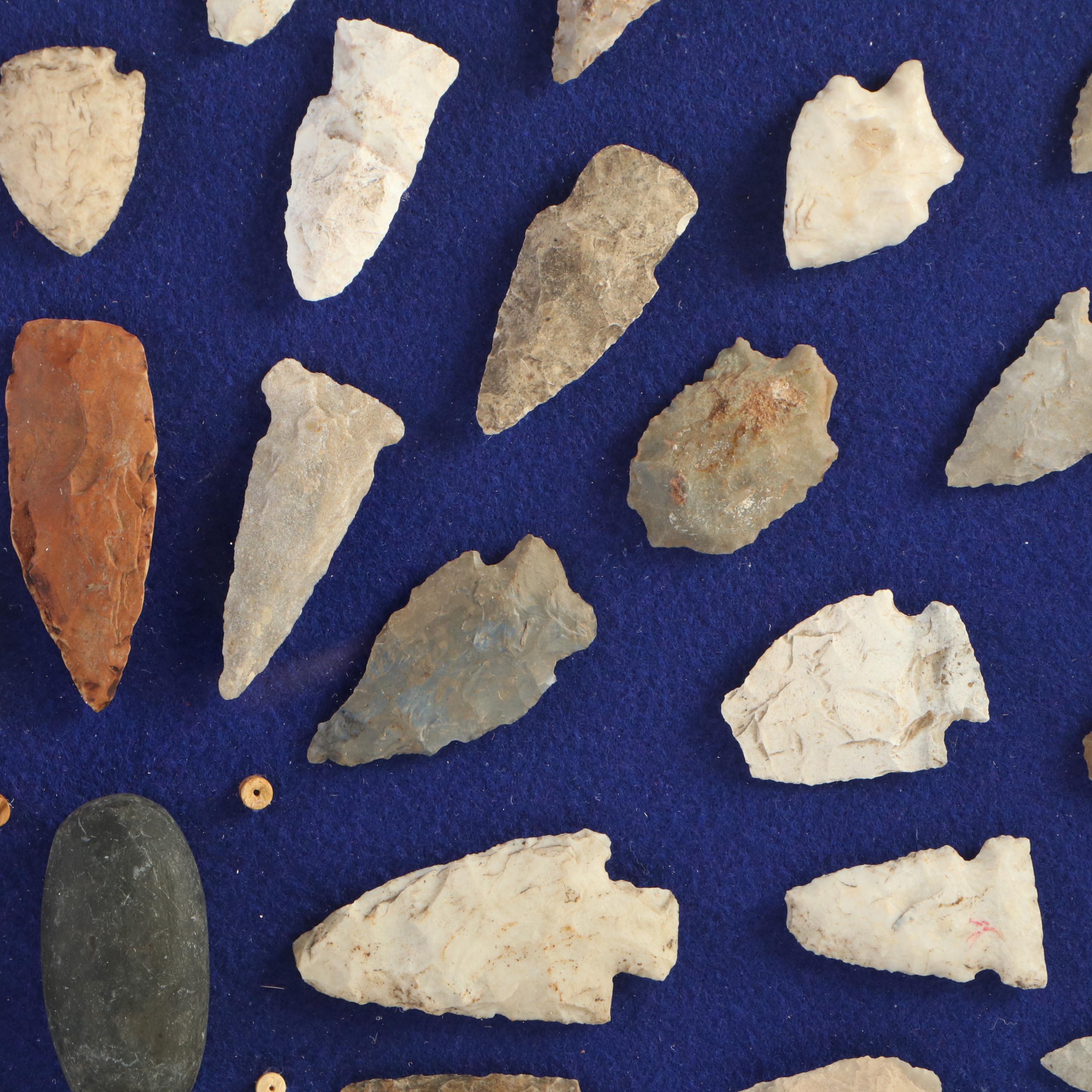 Knapped Stone Projectile Points, Beads, and Knapping Stone in Display Case