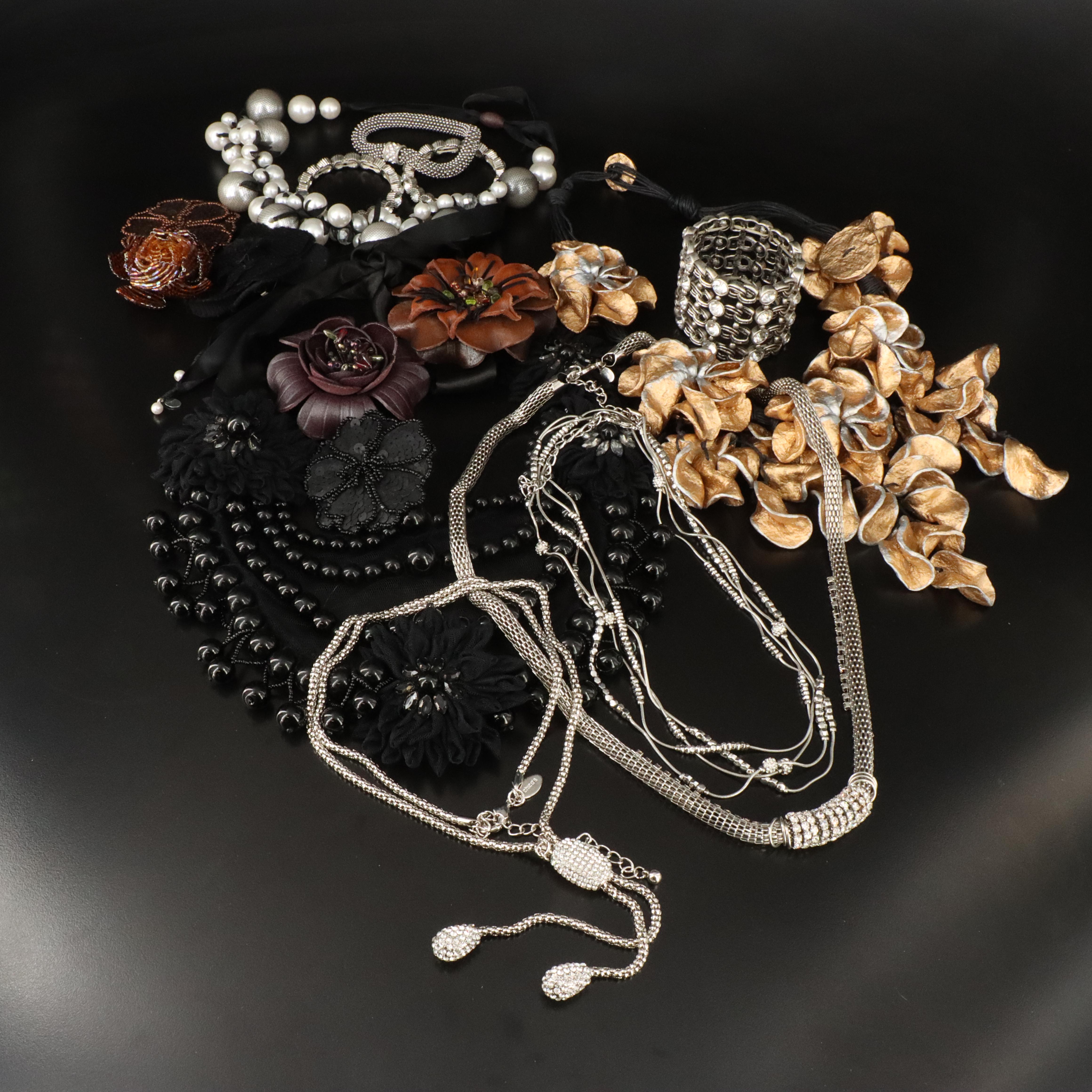 Jewelry Collection Featuring a Floral Necklace and Brooch, Chico's