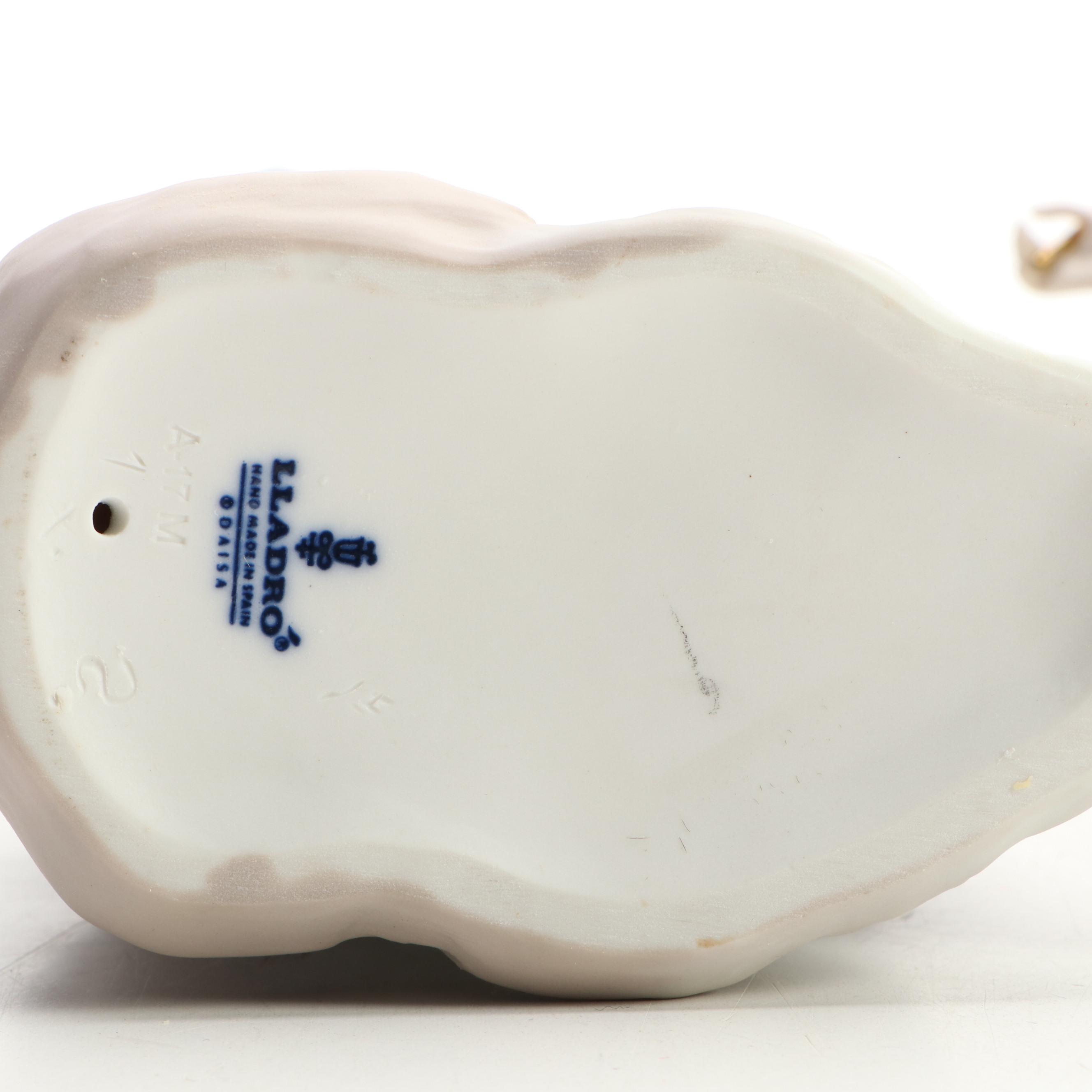 Lladró "Fairy" and "Sitting Girl with Lilies" Porcelain Figurines