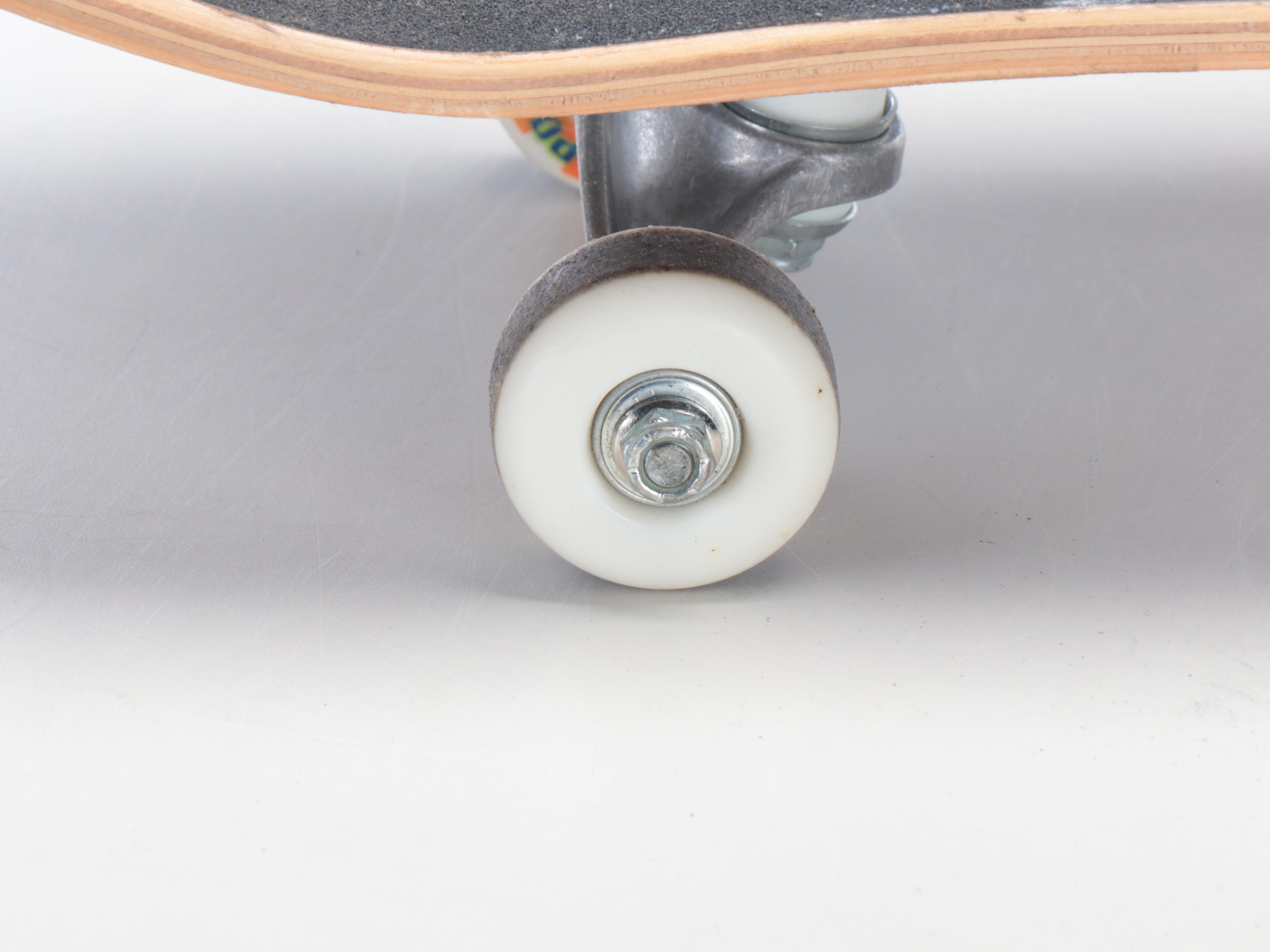 Rocket Power Maple Skateboard with Simpsons, Green Day, and Other Stickers