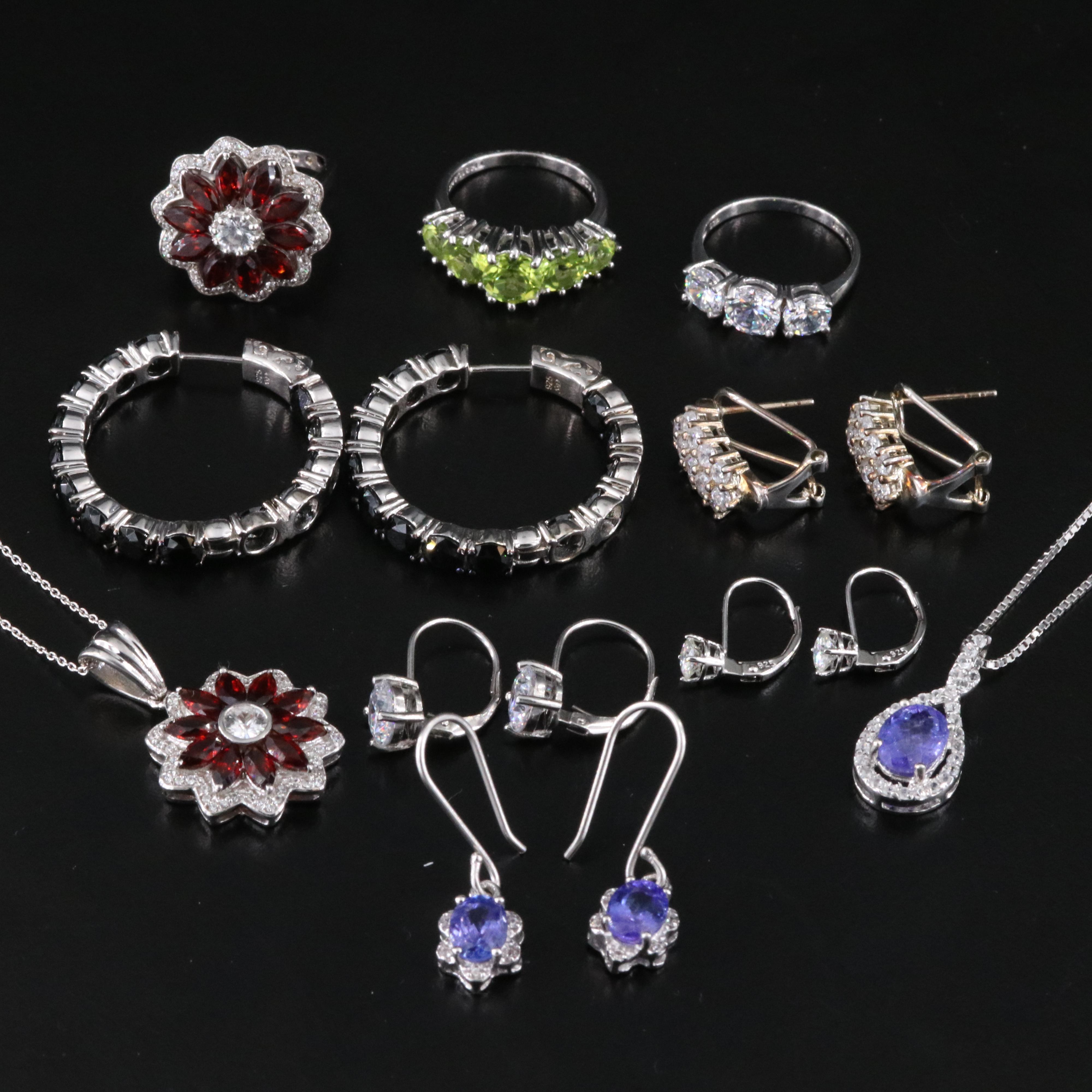 Sterling Gemstone Jewelry Collection Including Tanzanite, Garnet, and Topaz