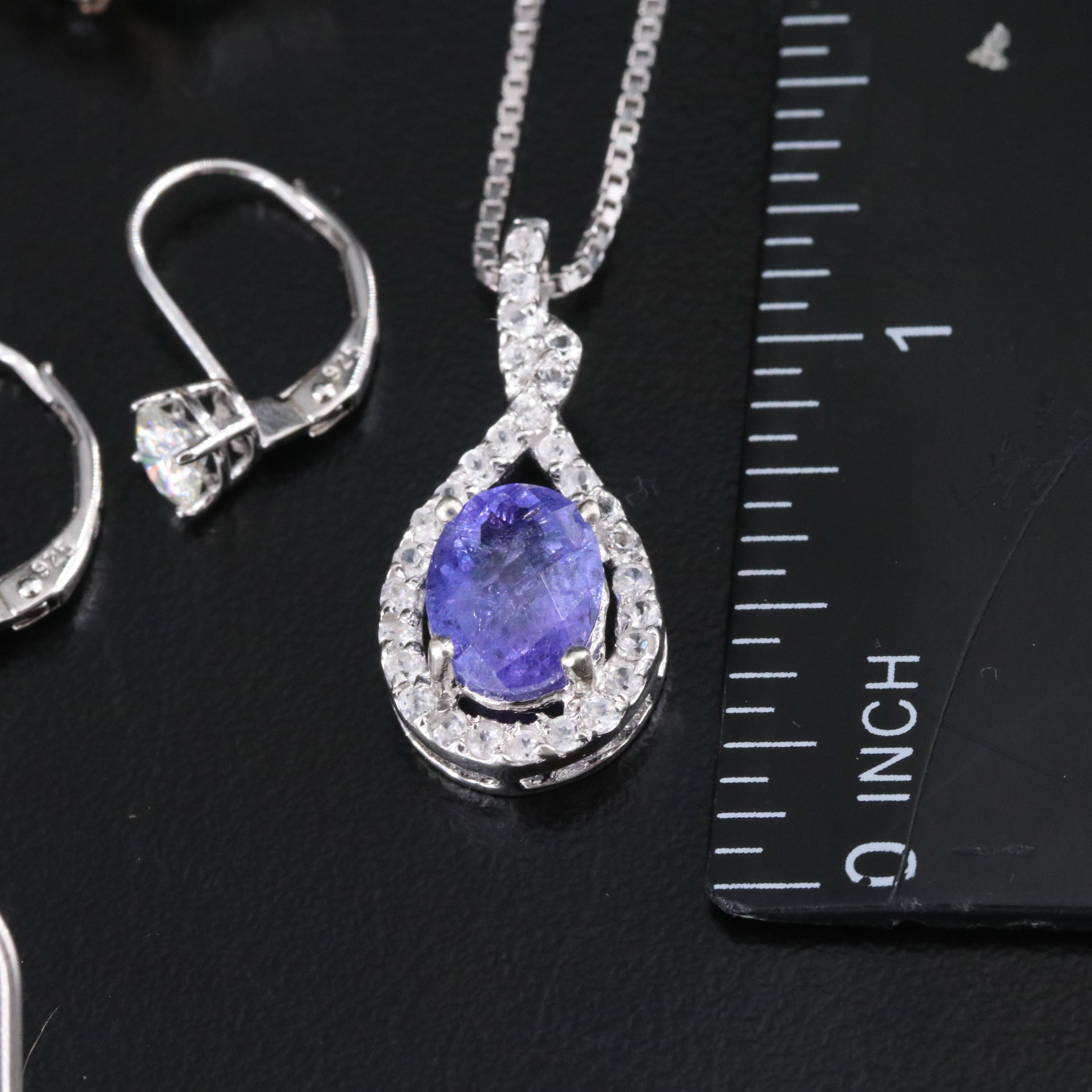 Sterling Gemstone Jewelry Collection Including Tanzanite, Garnet, and Topaz