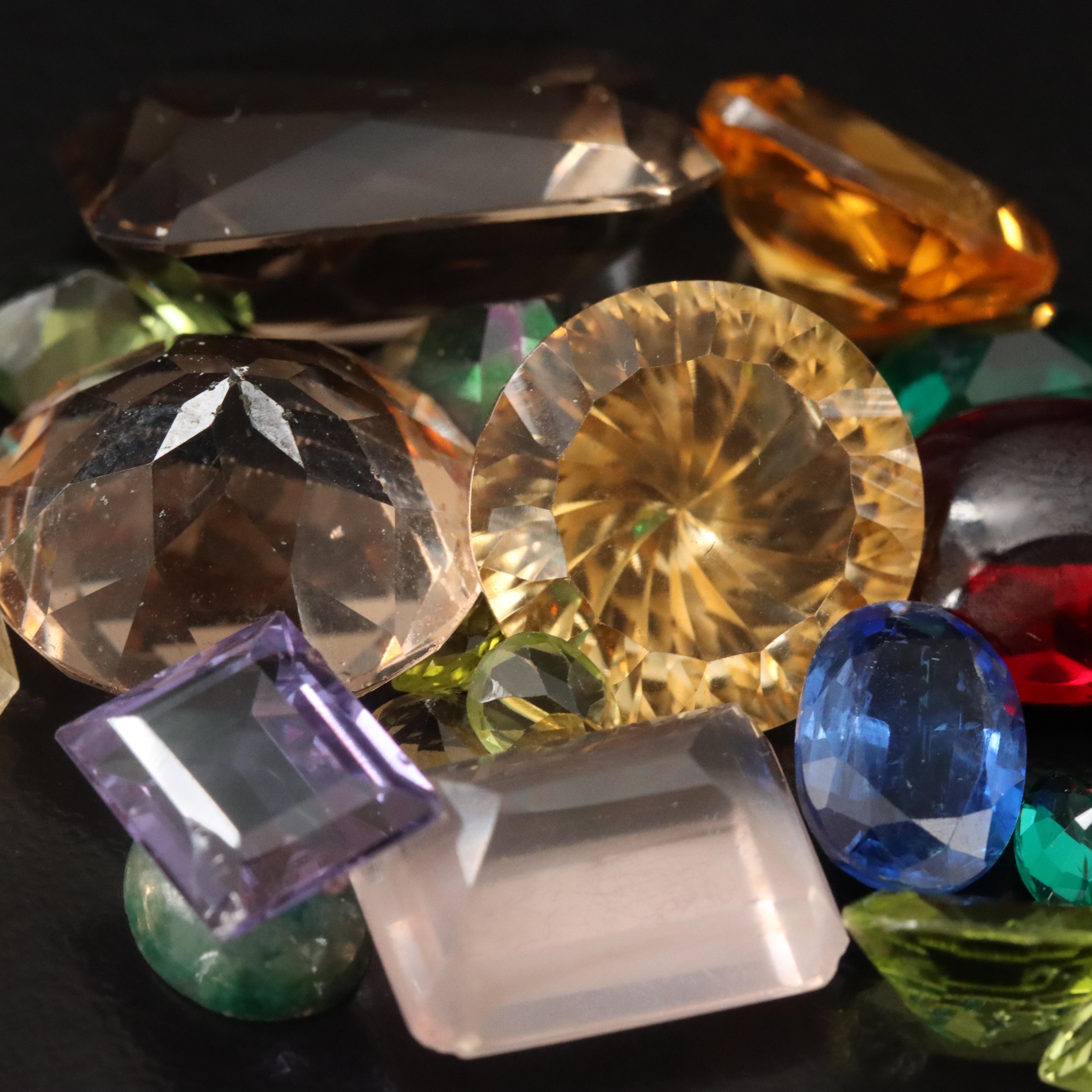 Loose 99.25 CTW Gemstone Lot Featuring Citrine, Lab Grown Emerald, and Kyanite