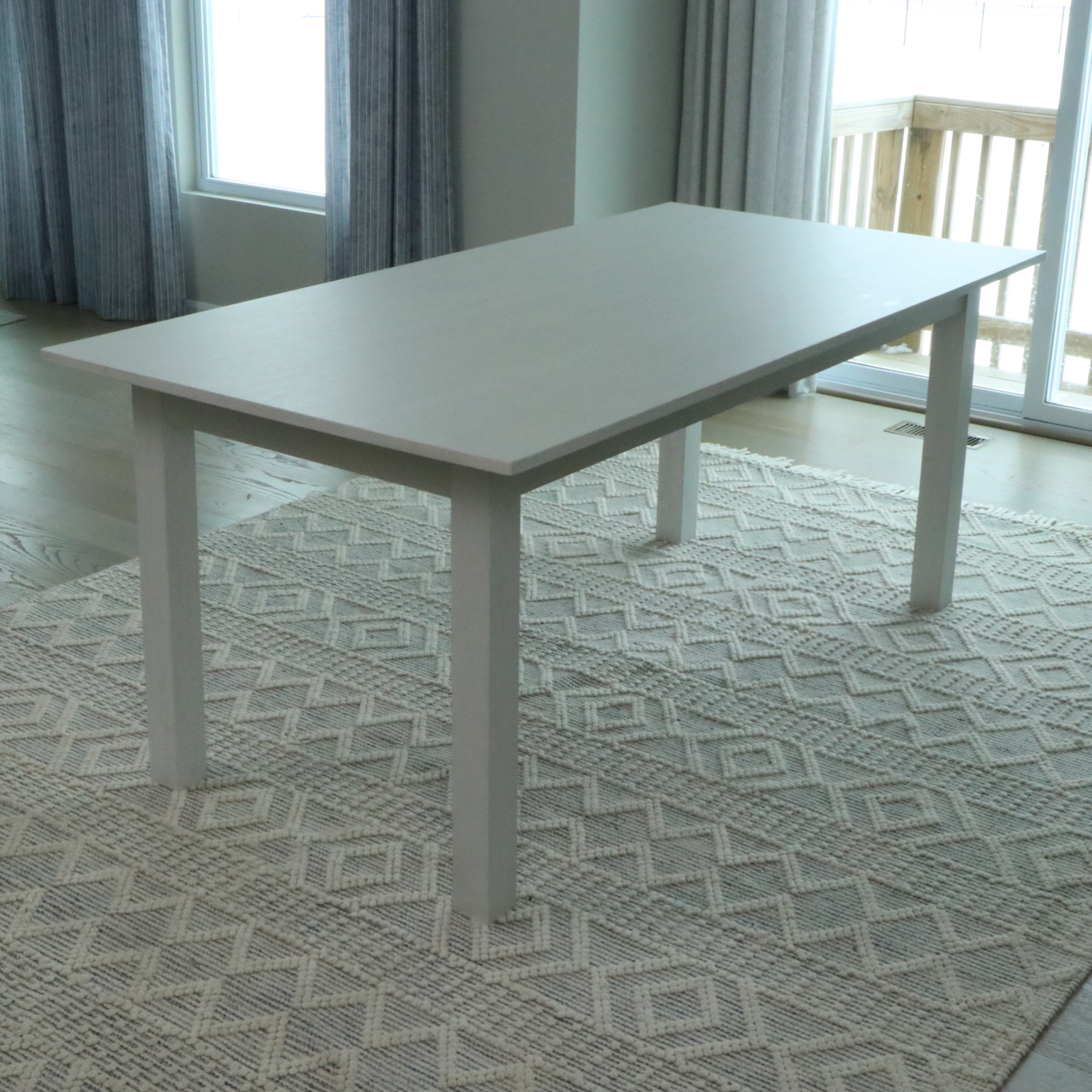 Universal Furniture Laminate Dining Table and Cane-Back Sled Base Chairs