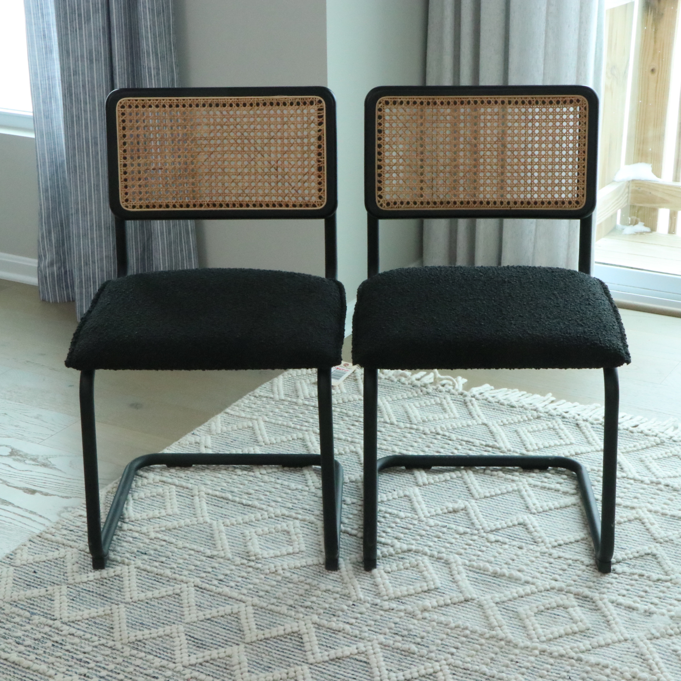 Universal Furniture Laminate Dining Table and Cane-Back Sled Base Chairs