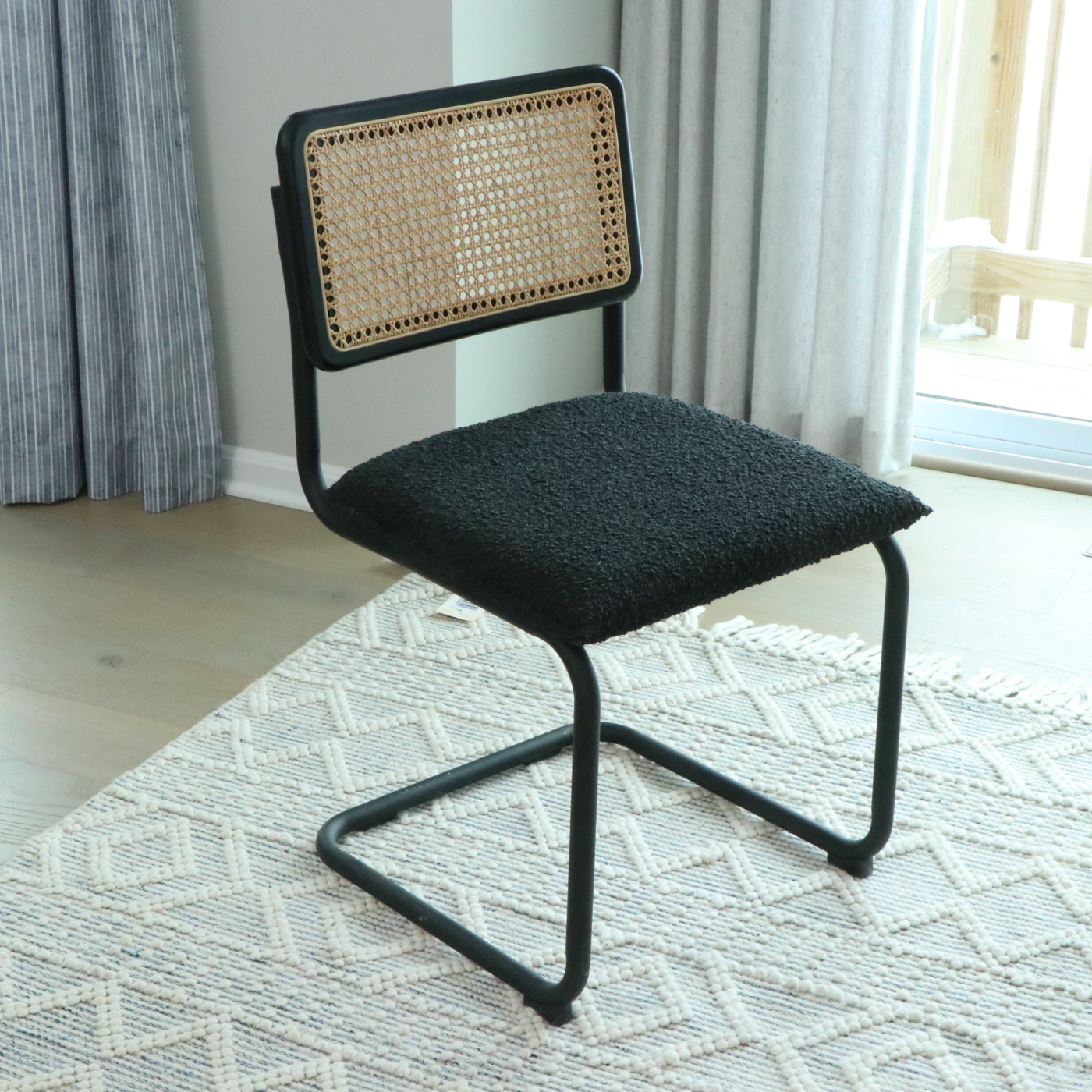 Universal Furniture Laminate Dining Table and Cane-Back Sled Base Chairs