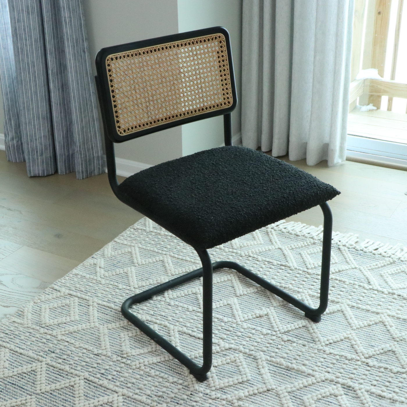 Universal Furniture Laminate Dining Table and Cane-Back Sled Base Chairs