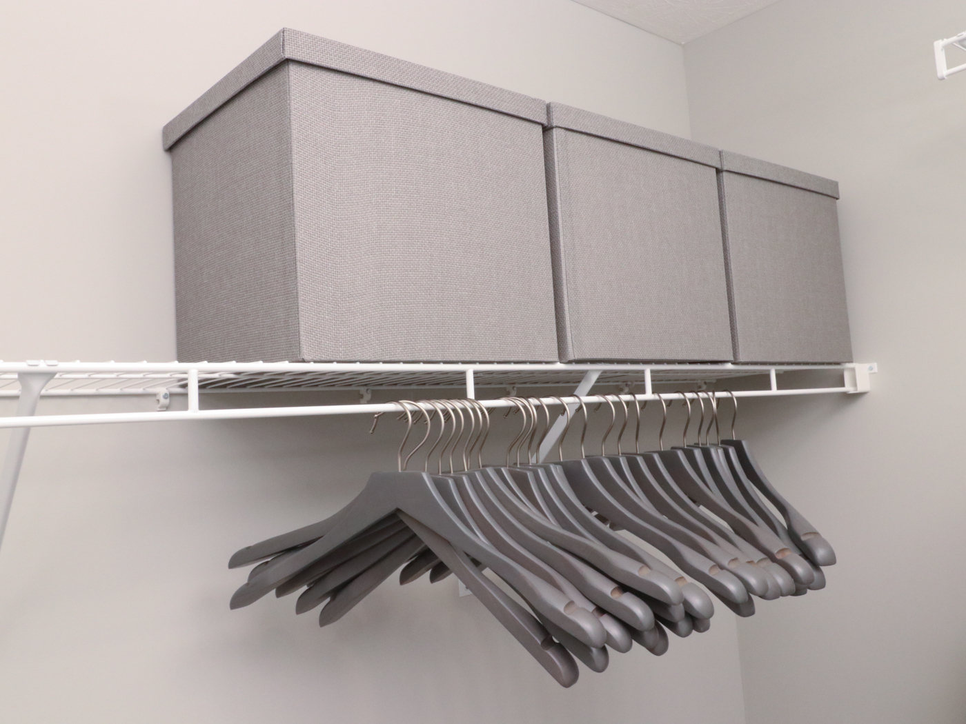 Textured Closet Storage Boxes and Wood Hangers