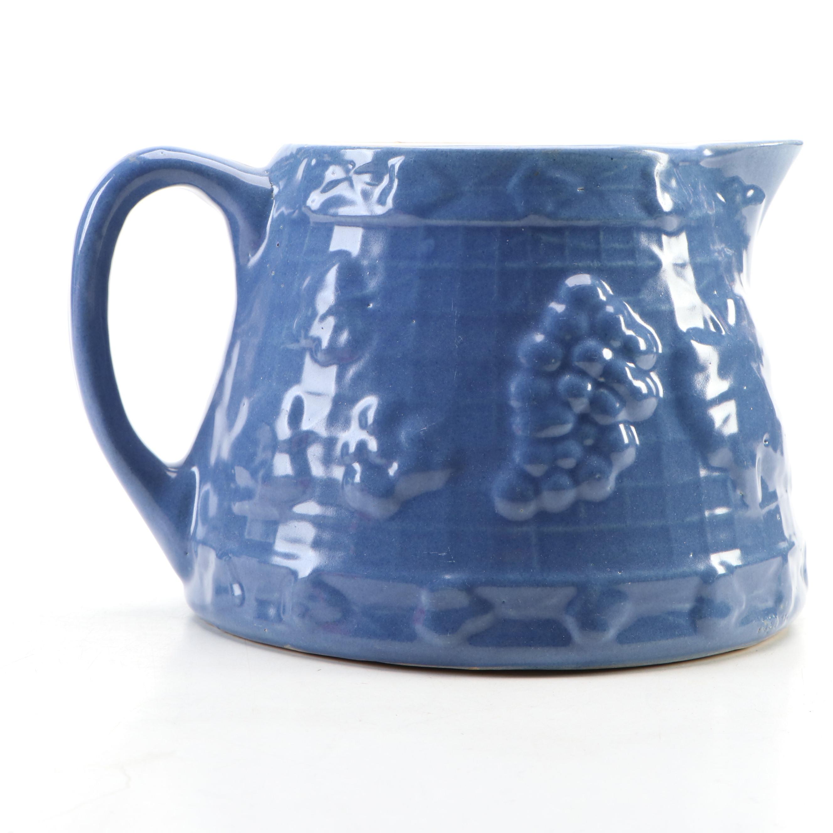 Uhl Pottery Pitcher with Other Ceramic Jack-o'-Lantern