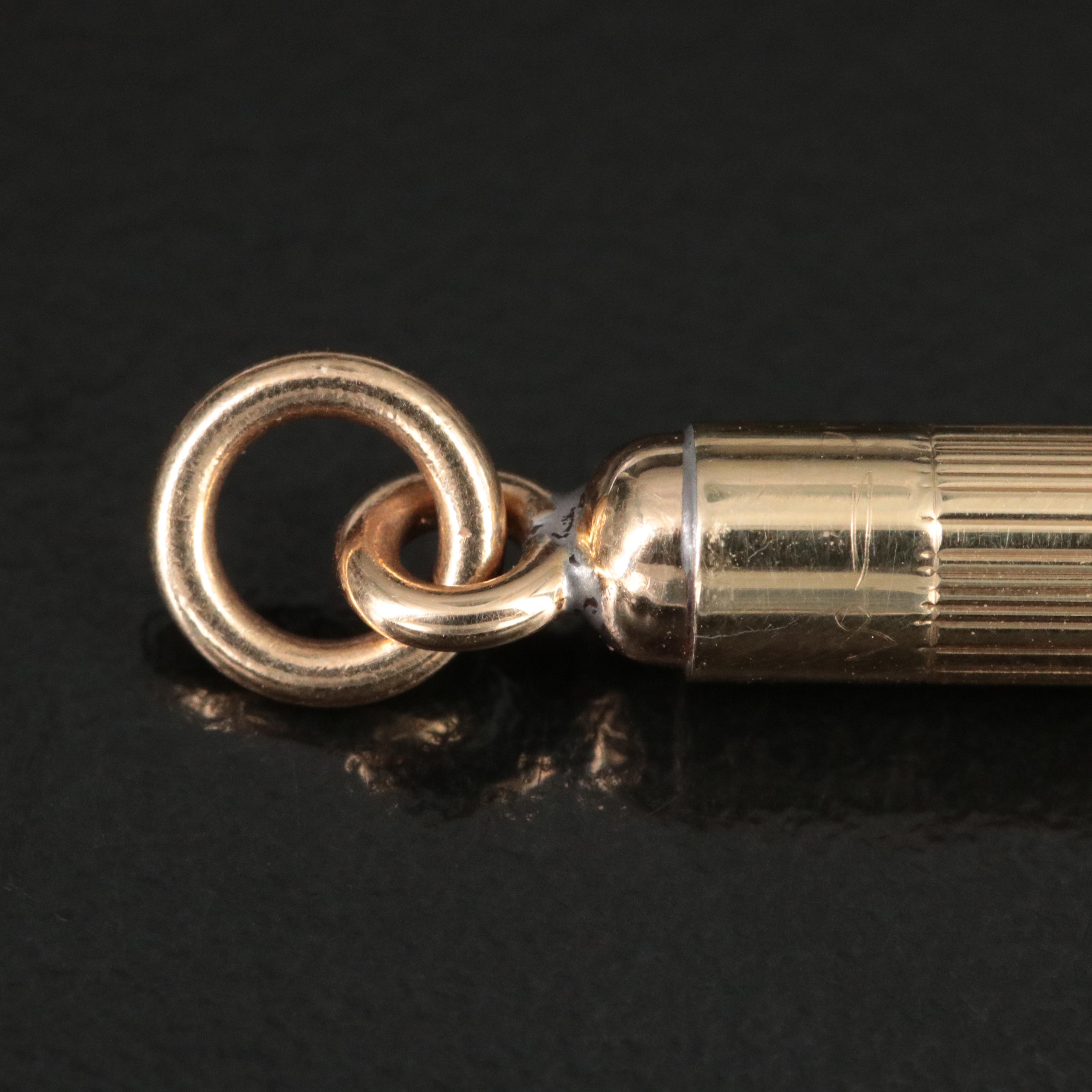 Tiffany & Co./Larter & Sons 14K Retractable Toothpick Pendant