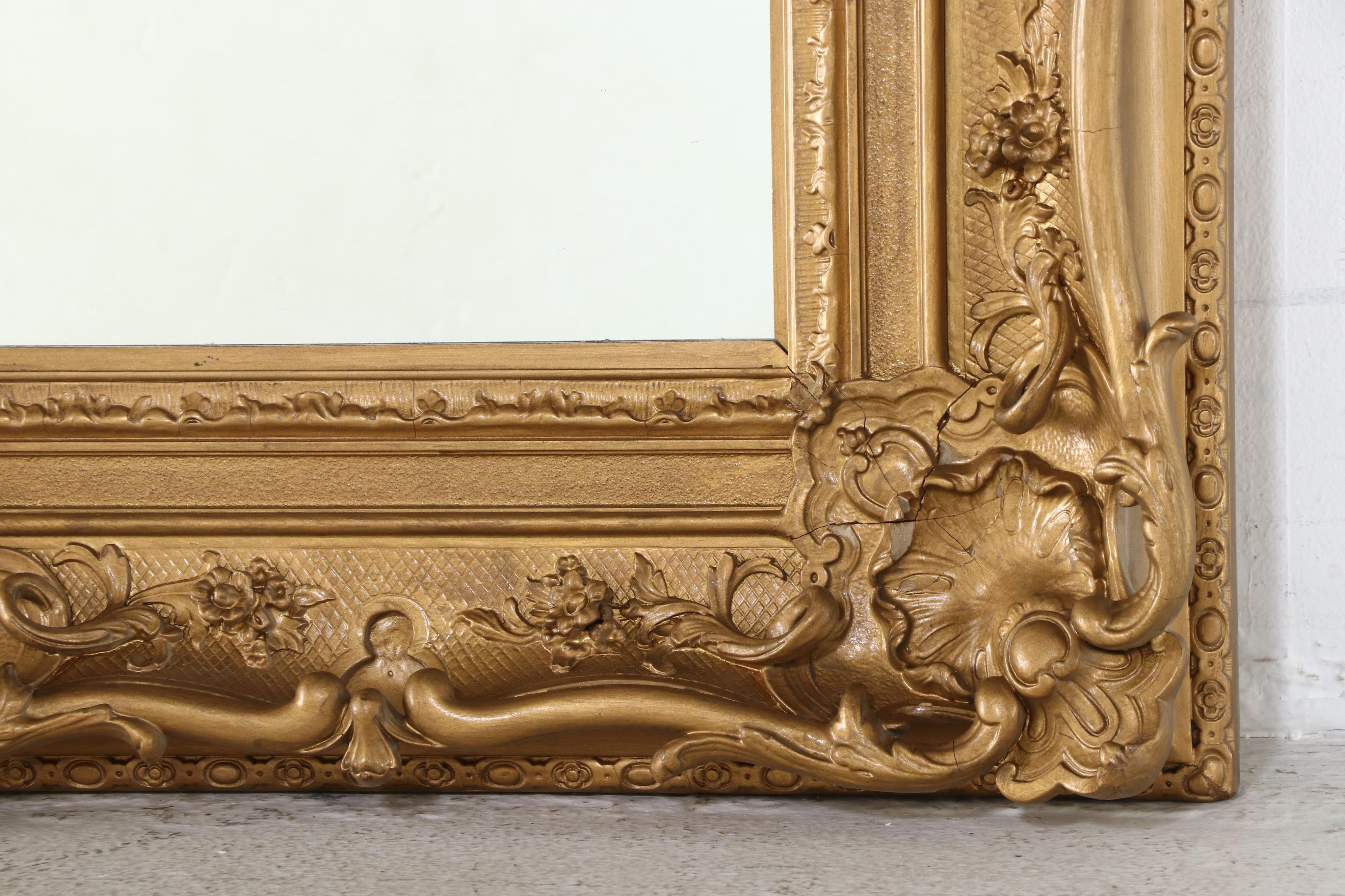 Monumental Rococo Style Giltwood and Composition Mirror, Early 20th Century
