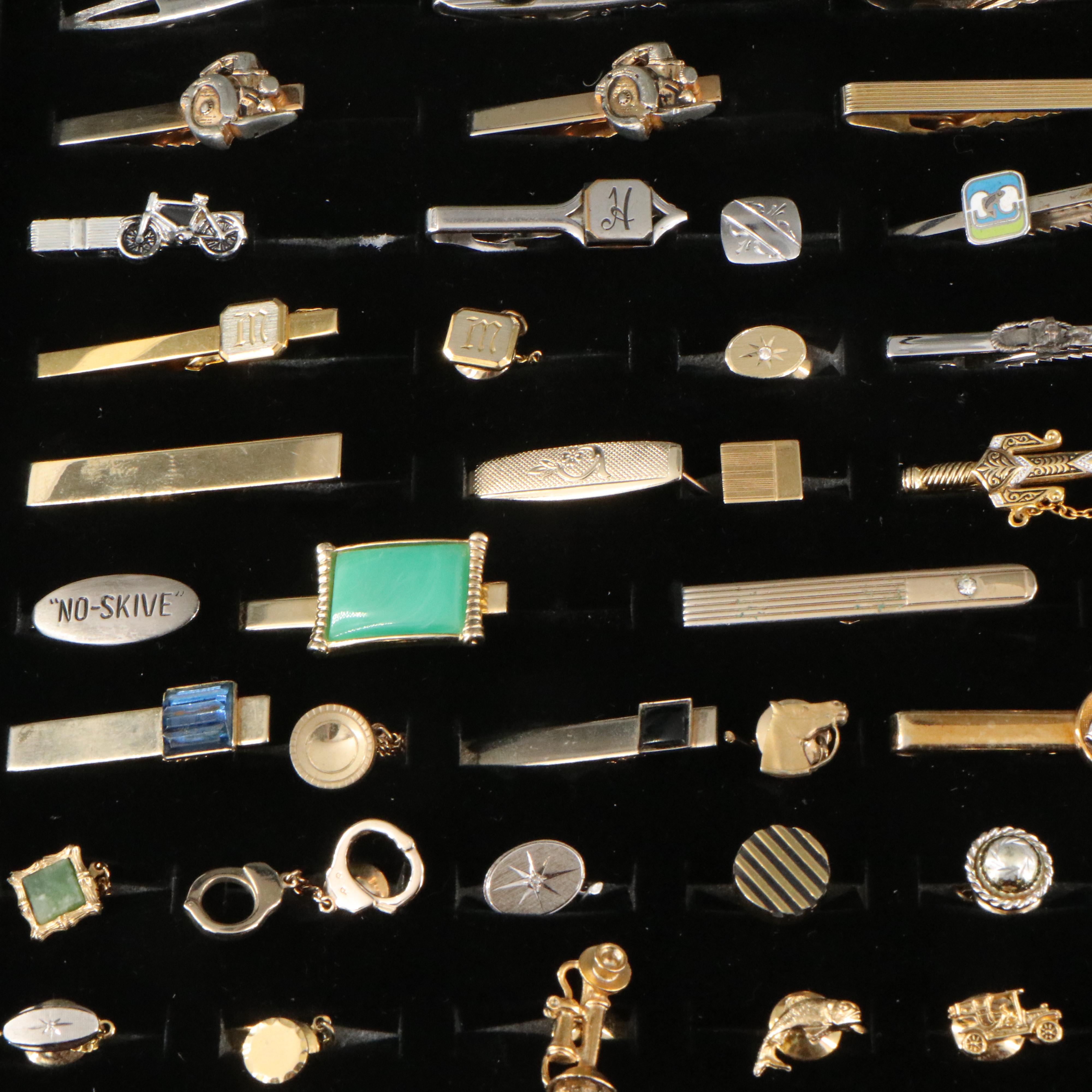 Vintage Collection of Tie Tacks and Tie Bars in a Display Case
