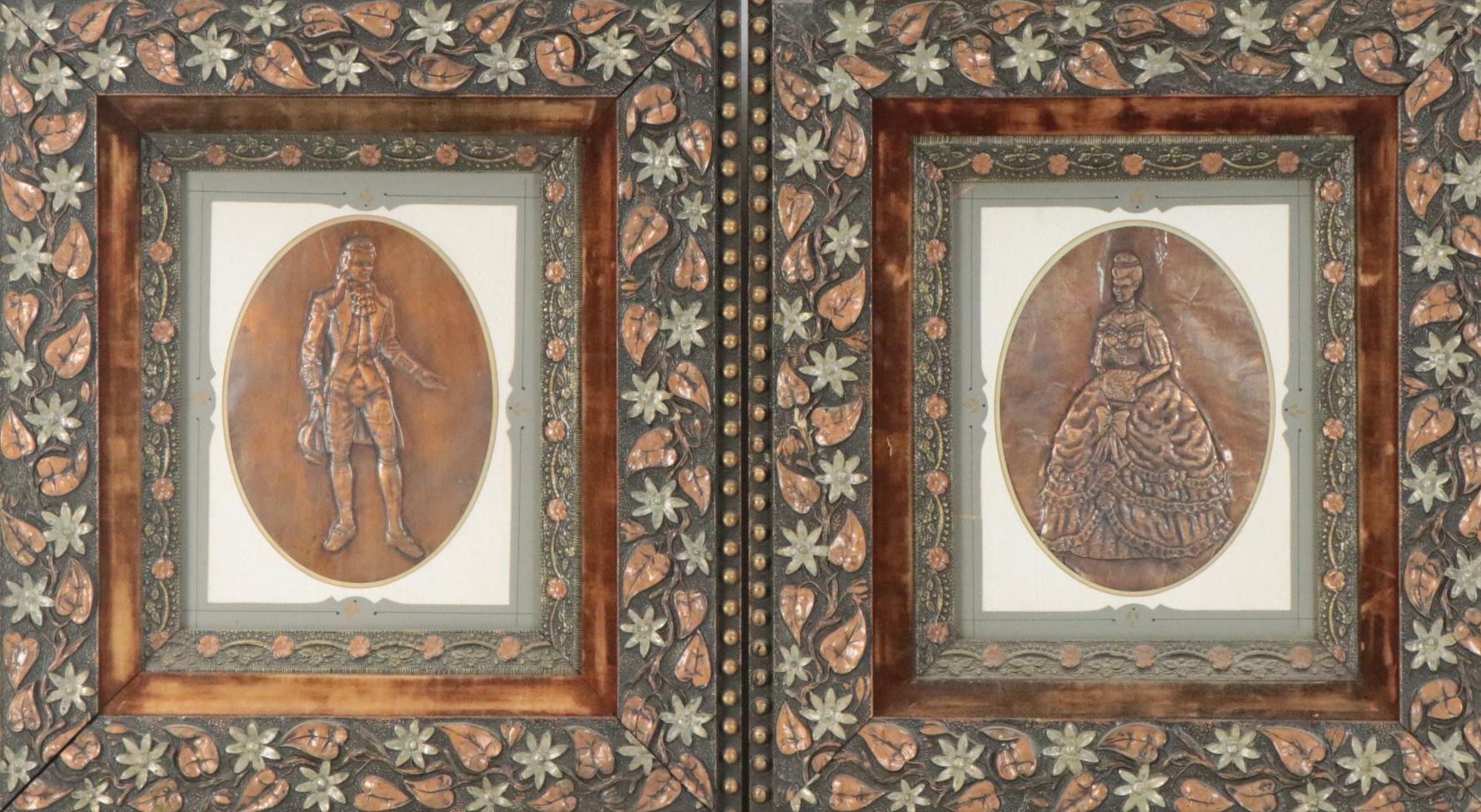 Embossed Hammered Copper Plaques of Colonial Man and Woman, 20th Century