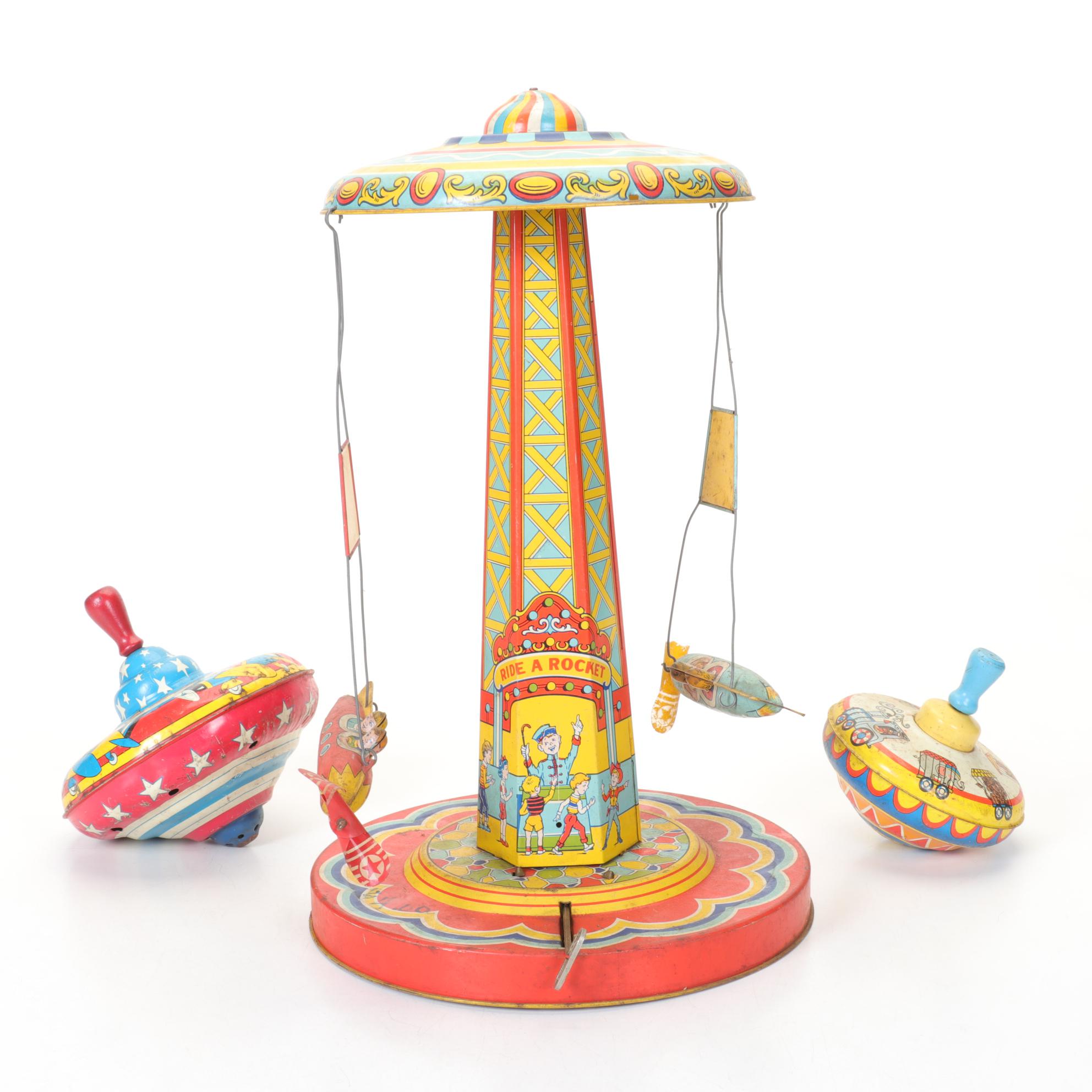 J. Chein "Ride a Rocket" Tin Litho Wind-Up Toy with Two Ohio Art Metal Tops