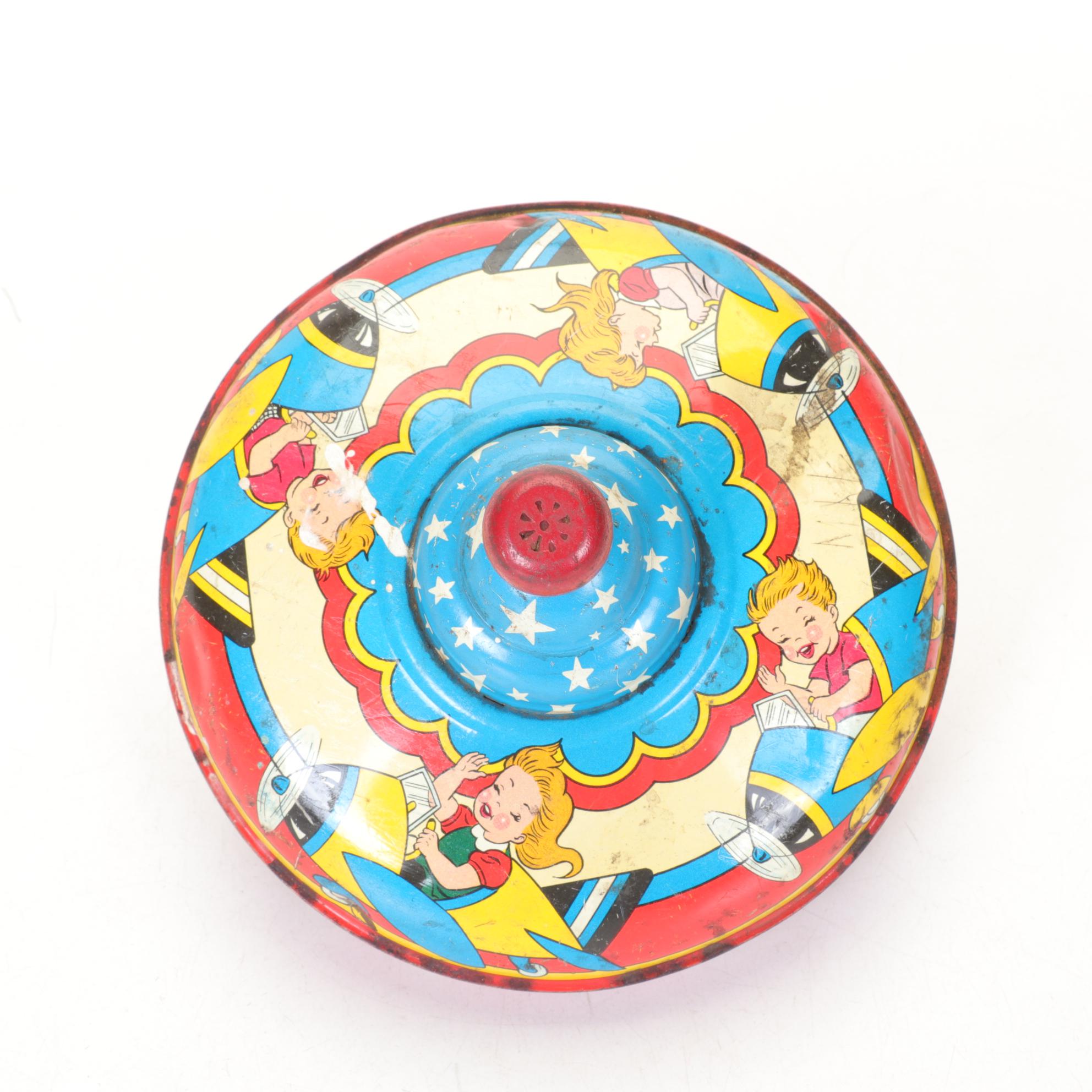 J. Chein "Ride a Rocket" Tin Litho Wind-Up Toy with Two Ohio Art Metal Tops