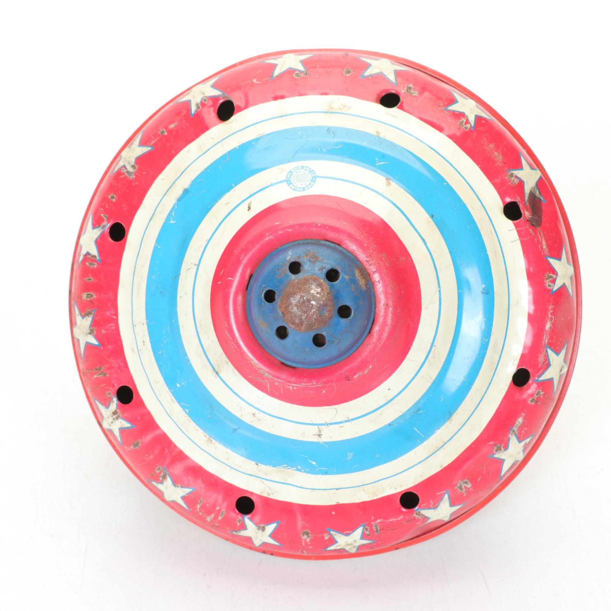 J. Chein "Ride a Rocket" Tin Litho Wind-Up Toy with Two Ohio Art Metal Tops