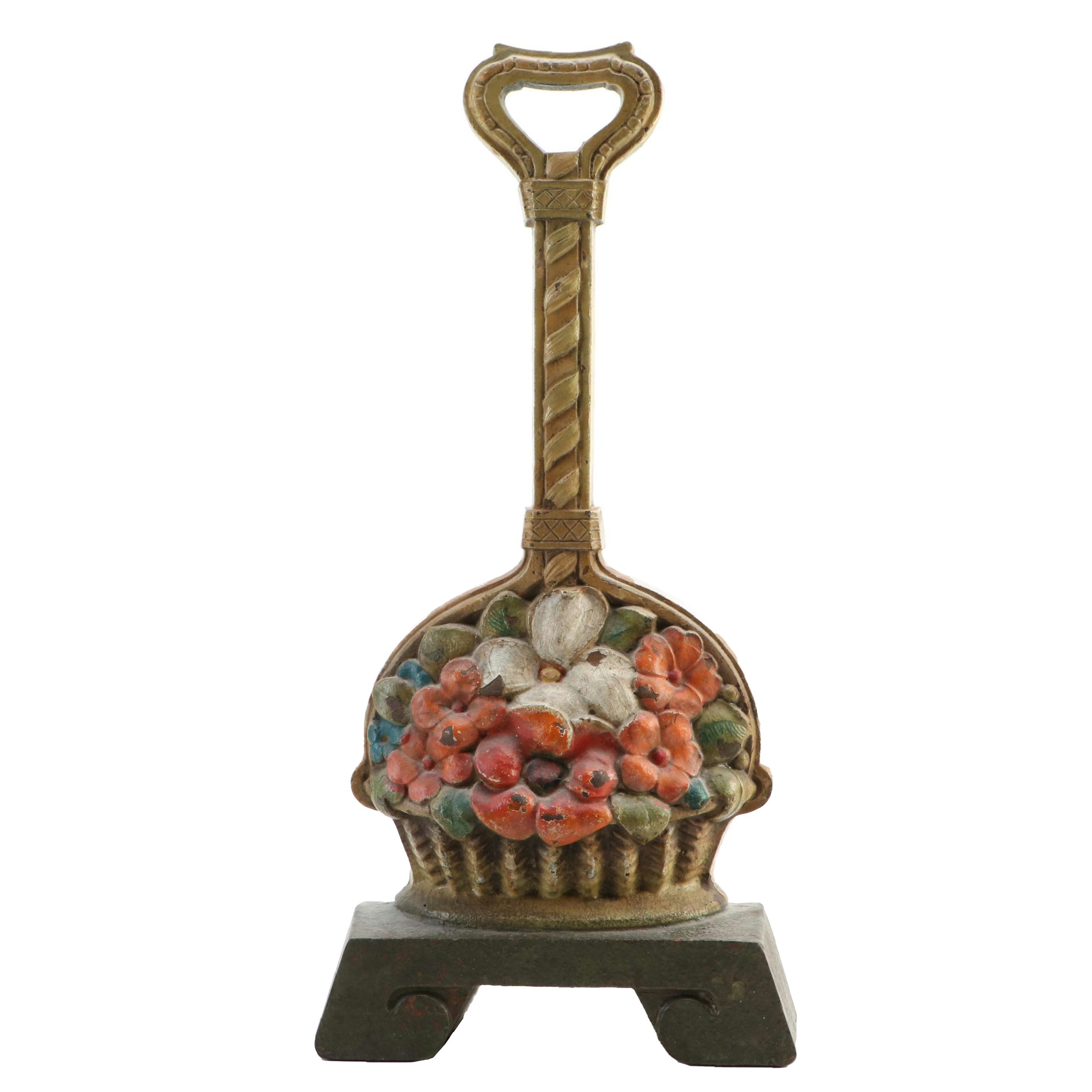 The Judd Manufacturing Company Cast Iron Dogwood Flower Basket Doorstop