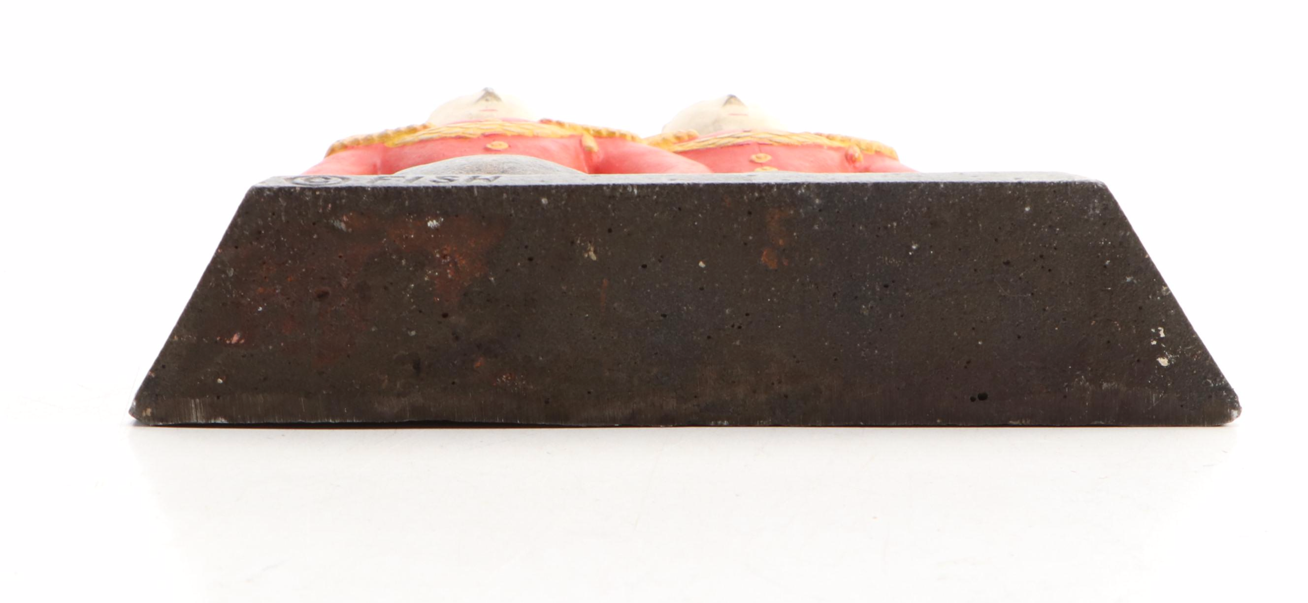 Hubley Anne Fish Painted Cast Iron Double Footmen Doorstop, Early to Mid-20th C.