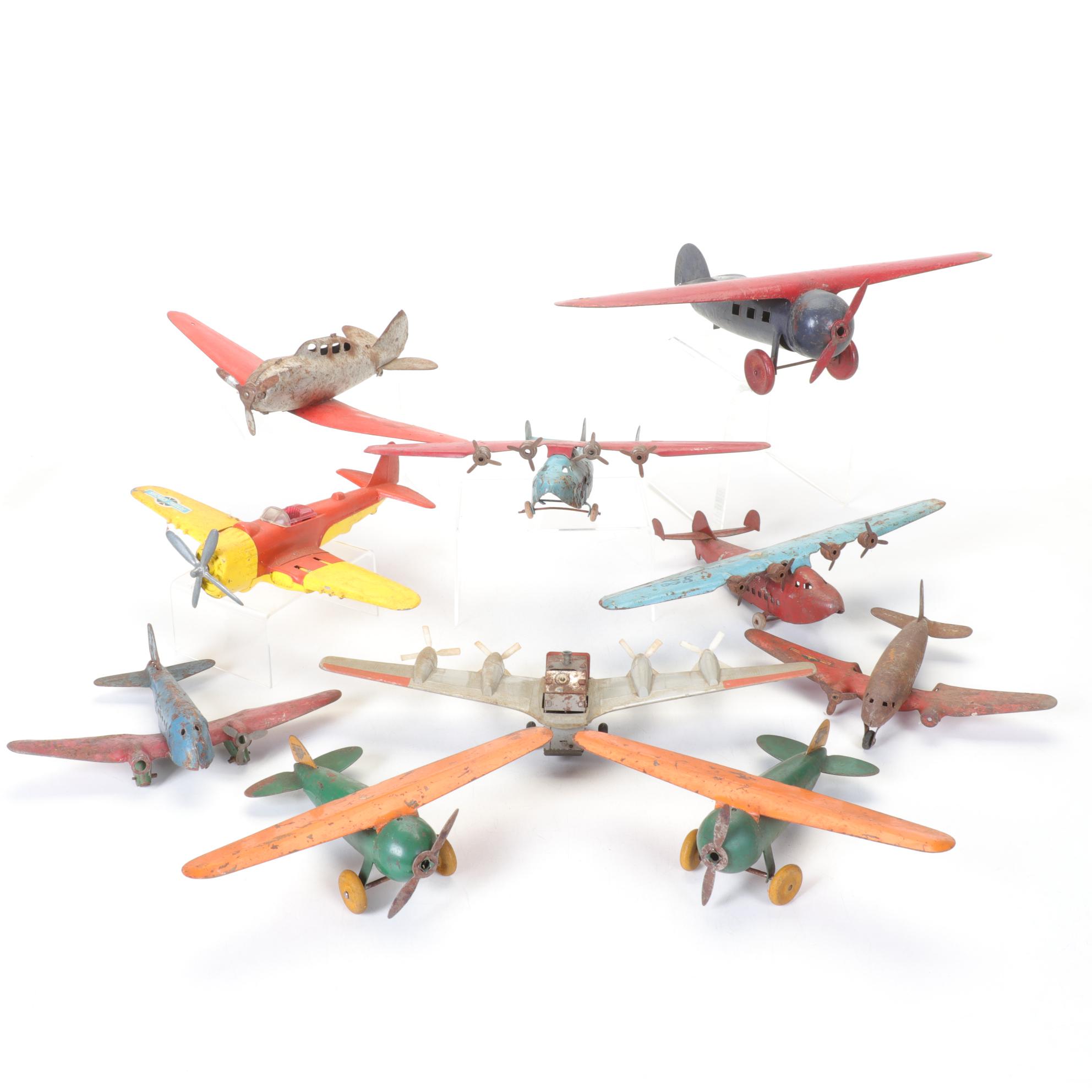 Wyandotte Pair of Pressed Steel Detroit Aircraft Models with Other Tin Planes