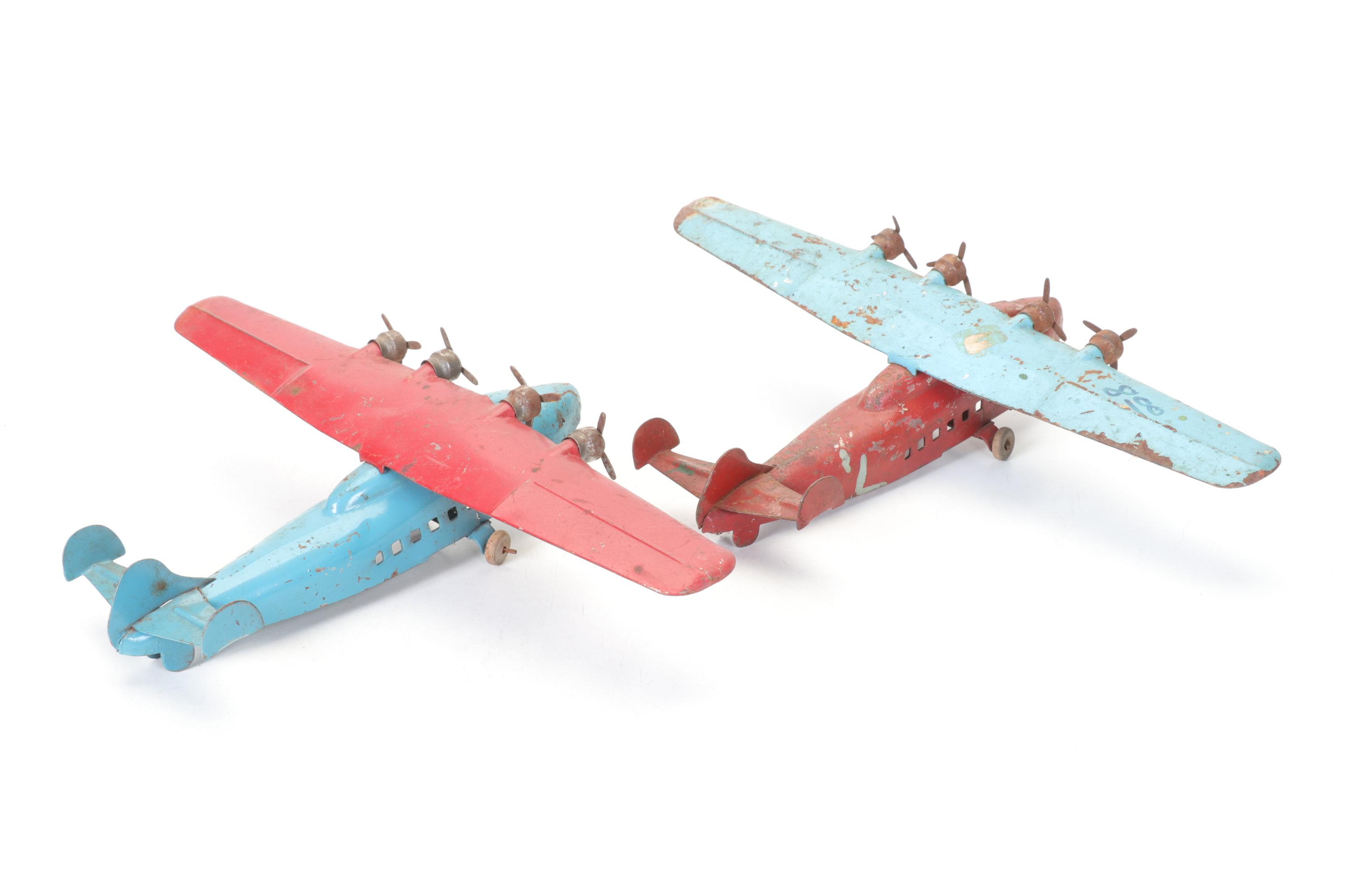 Wyandotte Pair of Pressed Steel Detroit Aircraft Models with Other Tin Planes