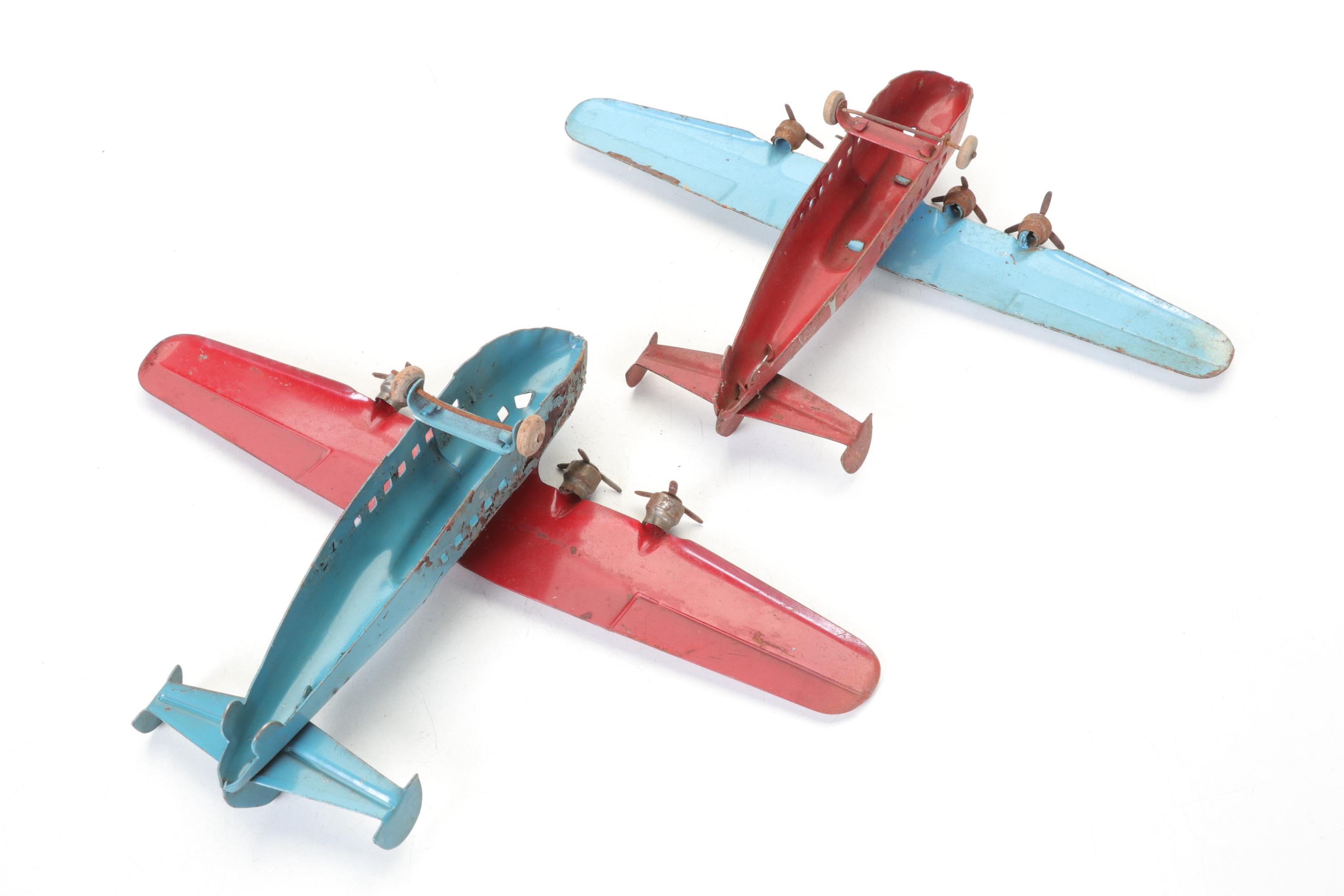 Wyandotte Pair of Pressed Steel Detroit Aircraft Models with Other Tin Planes